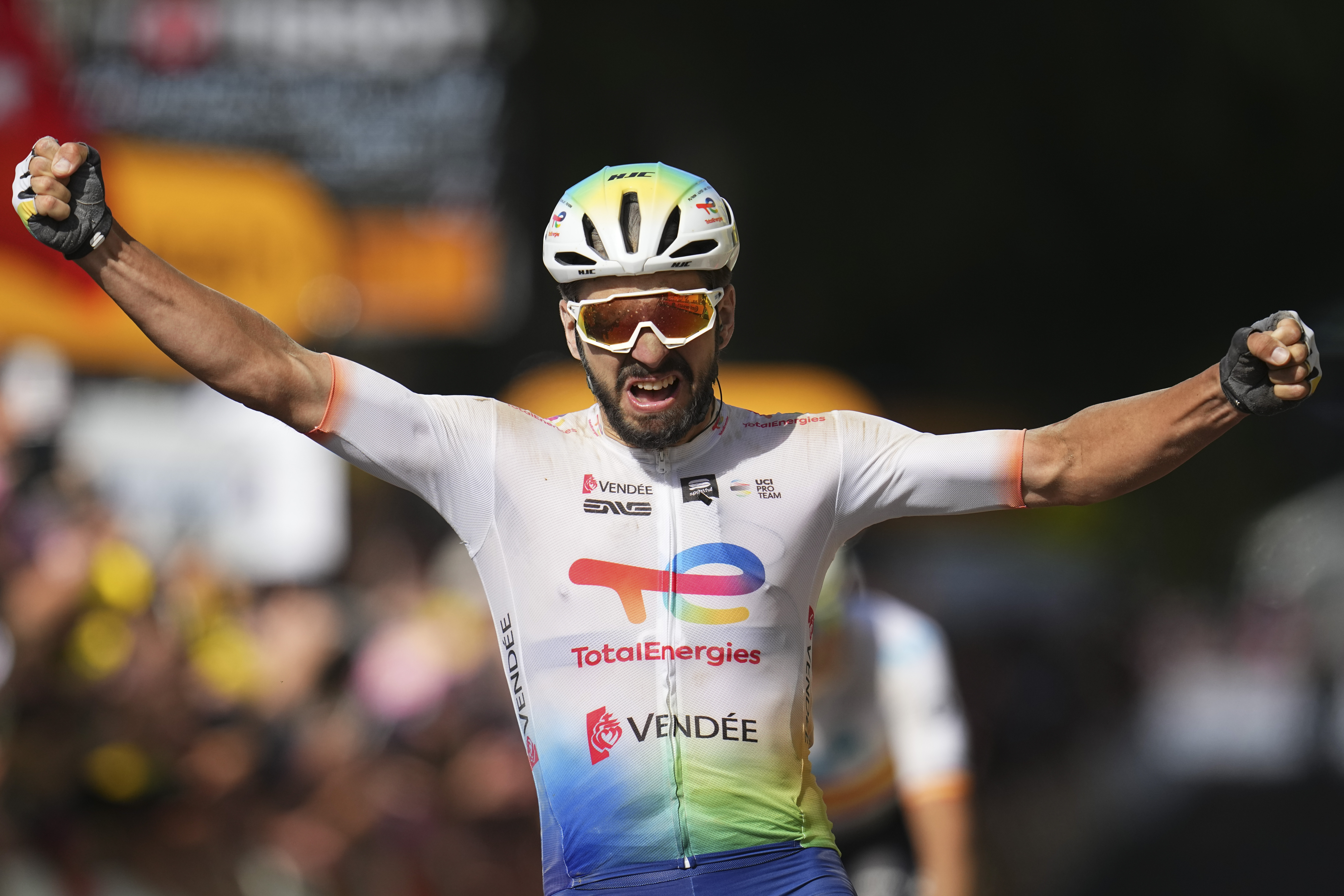 France's Anthony Turgis crosses the finish line to win the ninth stage of the Tour de France cycling race over 199 kilometers (123.7 miles) with start and finish in Troyes, France, Sunday, July 7, 2024.