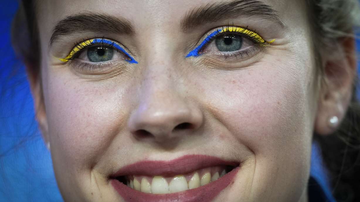 Silver medalist Yaroslava Mahuchikh of Ukraine wears eye makeup in her country's colors while competing in the women's high jump during the World Athletics Indoor Championships at the Emirates Arena in Glasgow, Scotland, Friday, March 1, 2024.