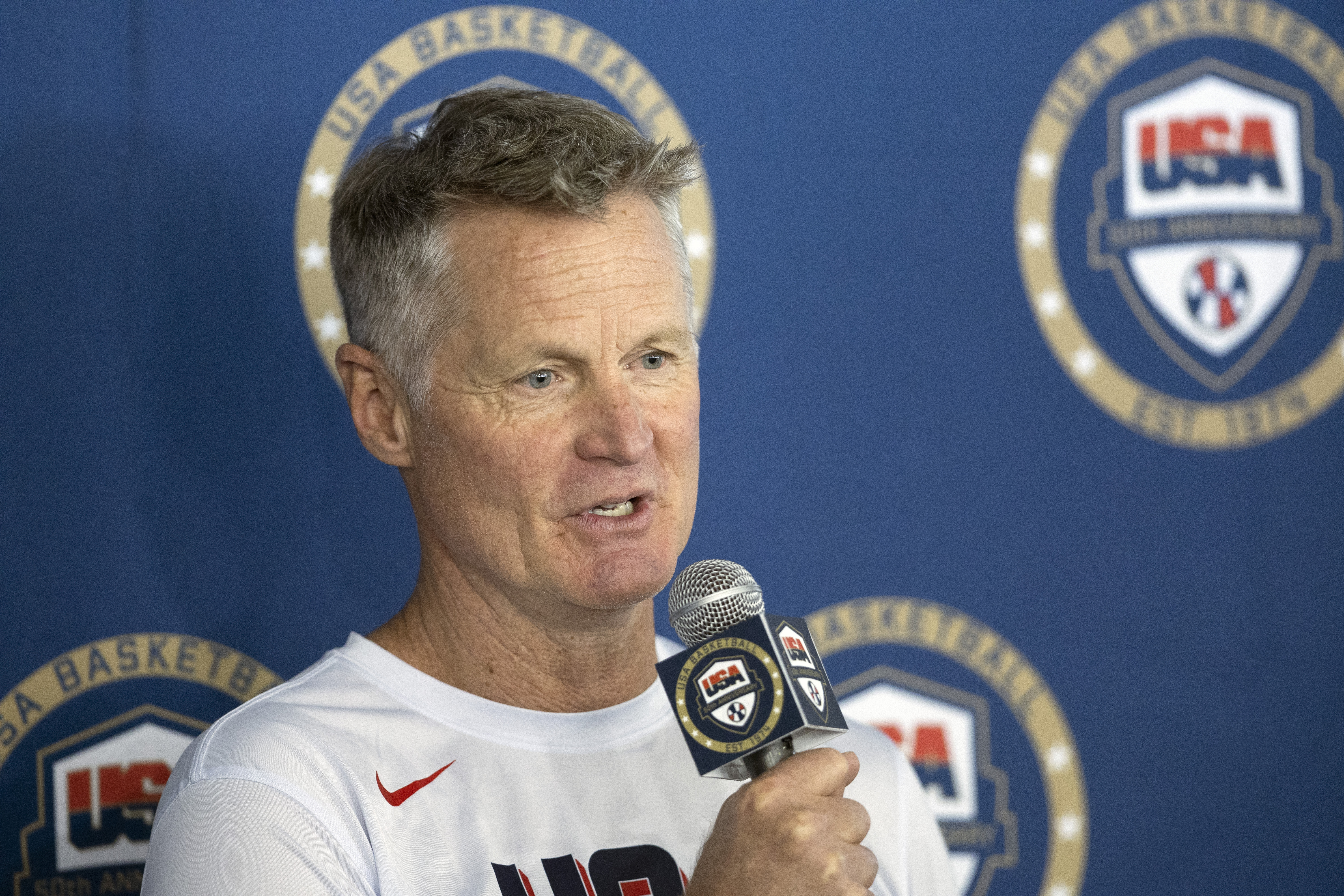 United States men's Olympic basketball coach Steve Kerr responds to a question from a reporter during training camp for the team Saturday, July 6, 2024, in Las Vegas. 