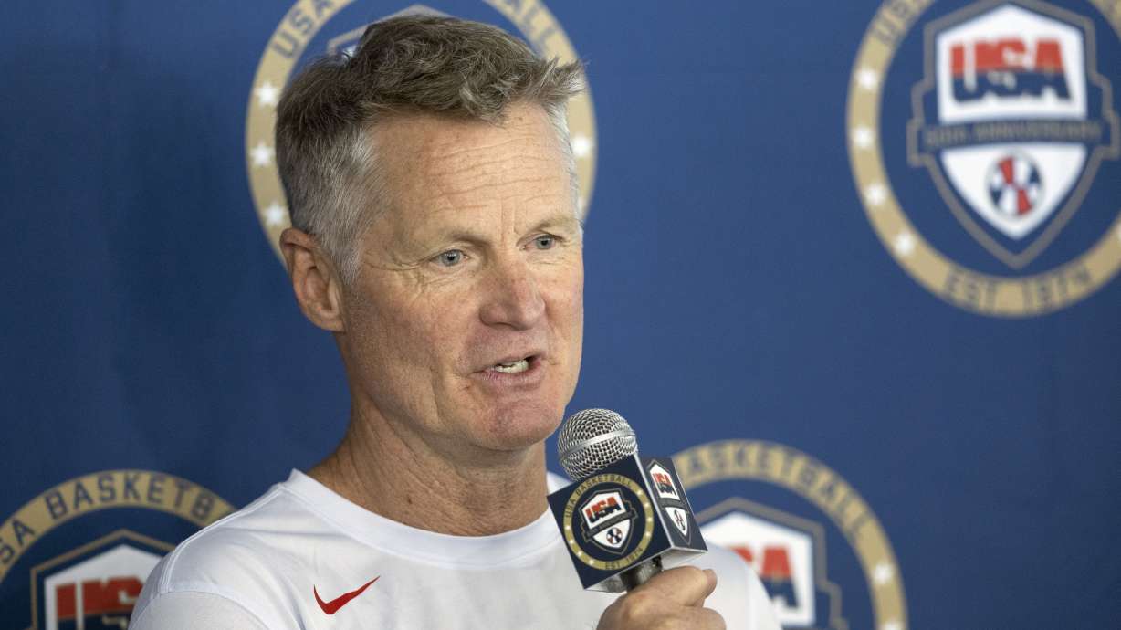 United States men's Olympic basketball coach Steve Kerr responds to a question from a reporter during training camp for the team Saturday, July 6, 2024, in Las Vegas.