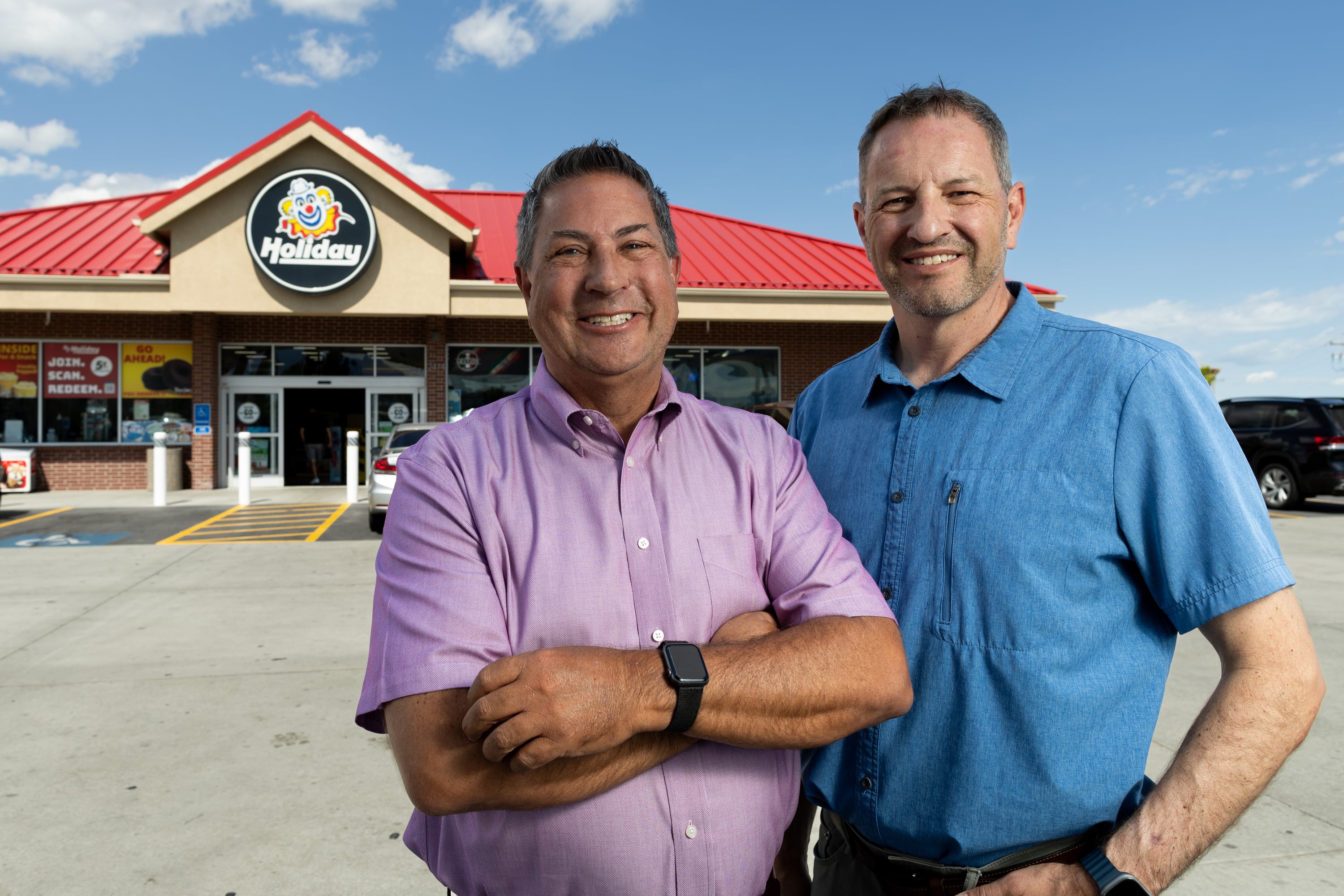 From left, Scott Wagstaff and Mike Wagstaff, co-presidents of Holiday Oil, pose for a portrait at a Holiday in Magna on June 27.