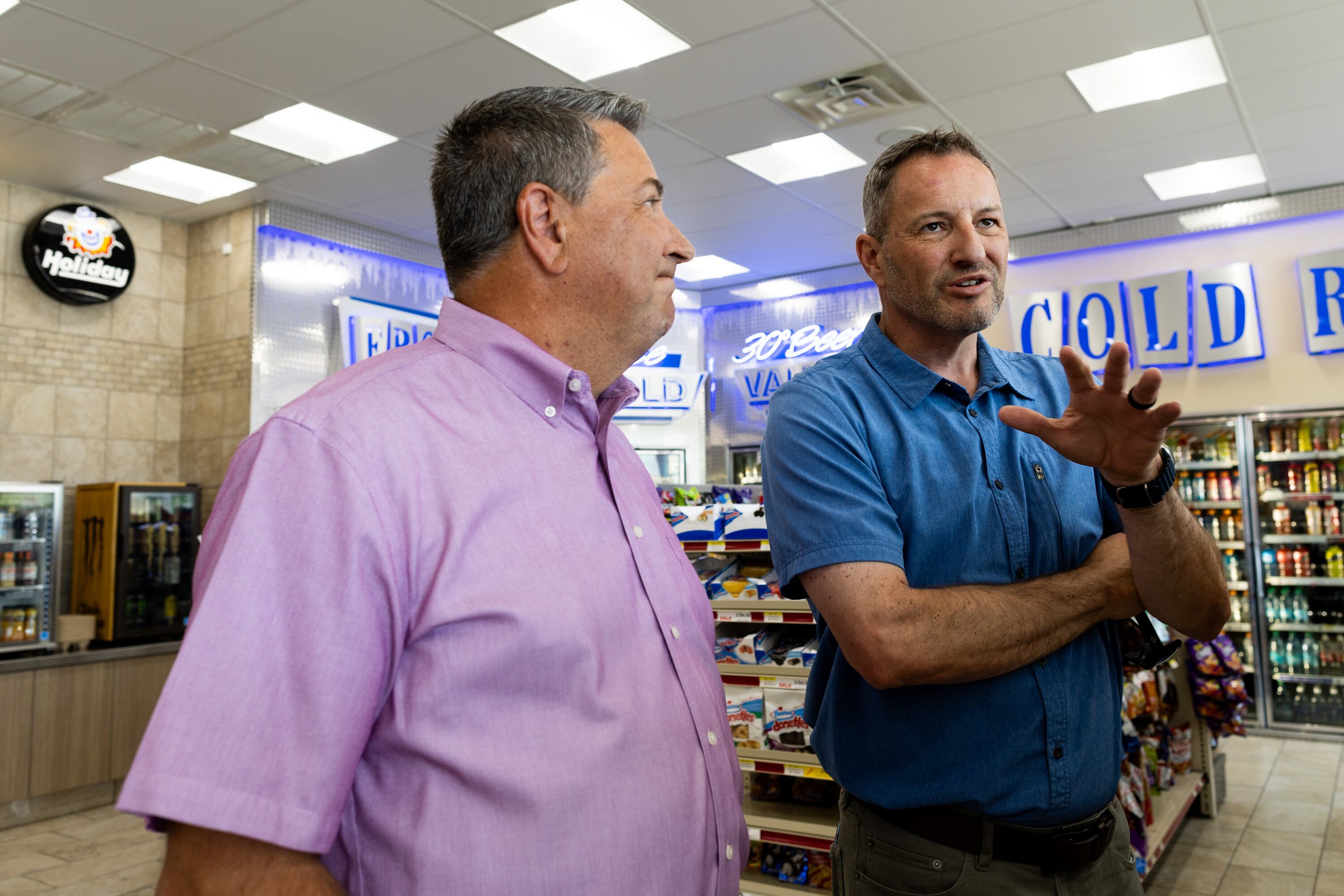 From left, Scott Wagstaff and Mike Wagstaff, co-presidents of Holiday Oil, talk during an interview at a Holiday in Magna on June 27.