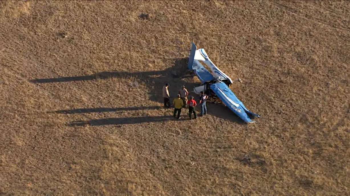 First responders at a crashed plane in Cedar Valley on Sunday. A Springville man was killed in the crash.