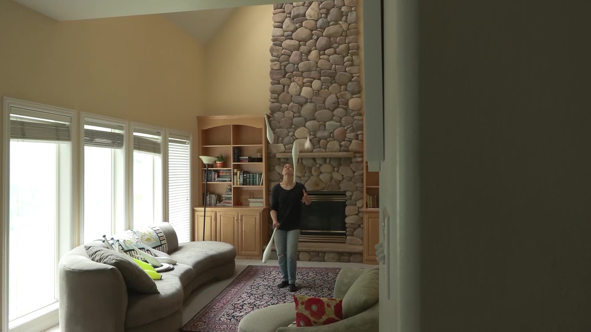 Delaney Bayles in her living room practicing her juggling skills in an undated photo.