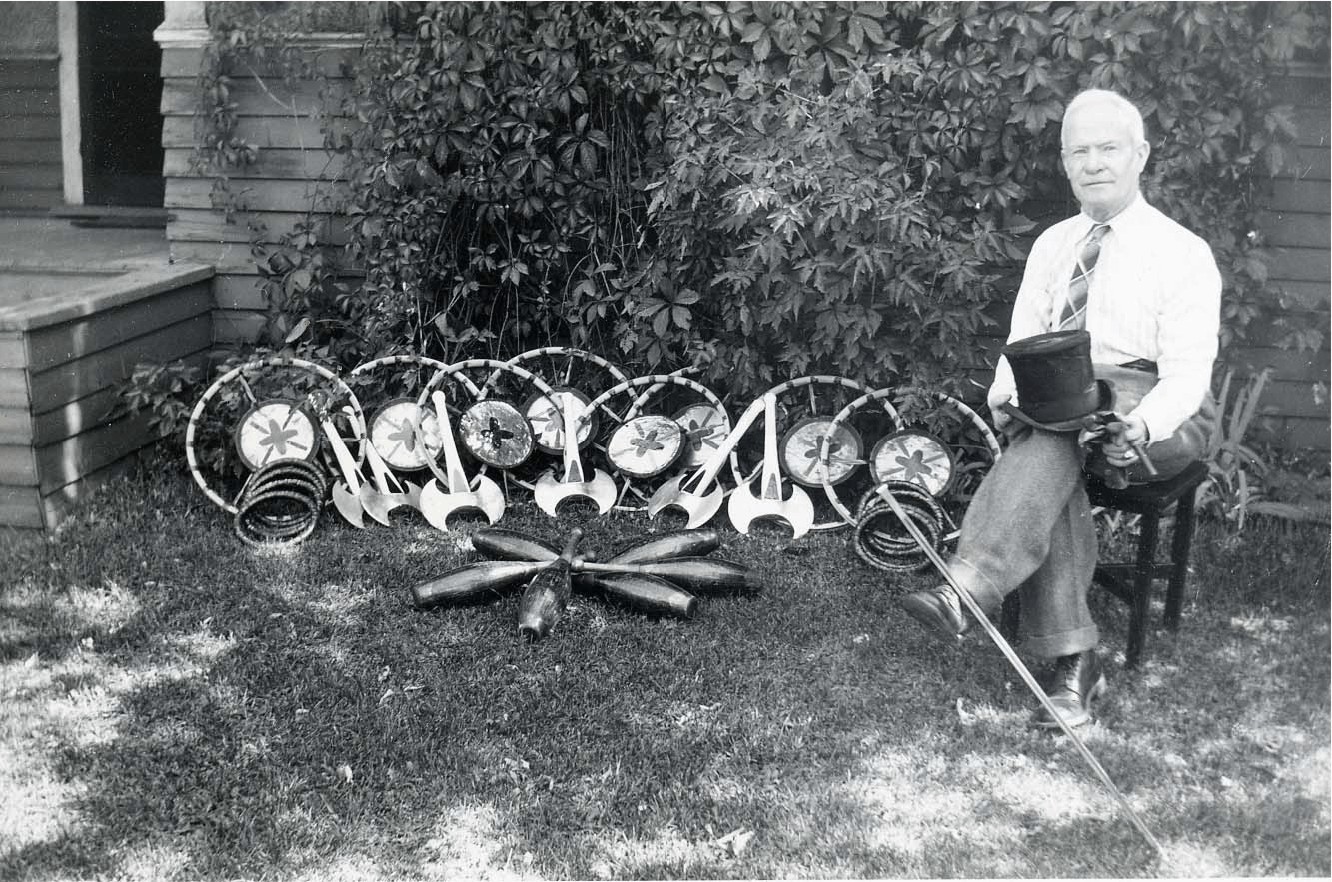 An older John Phillip Thomas sits with his gear of juggling items in an undated photo.