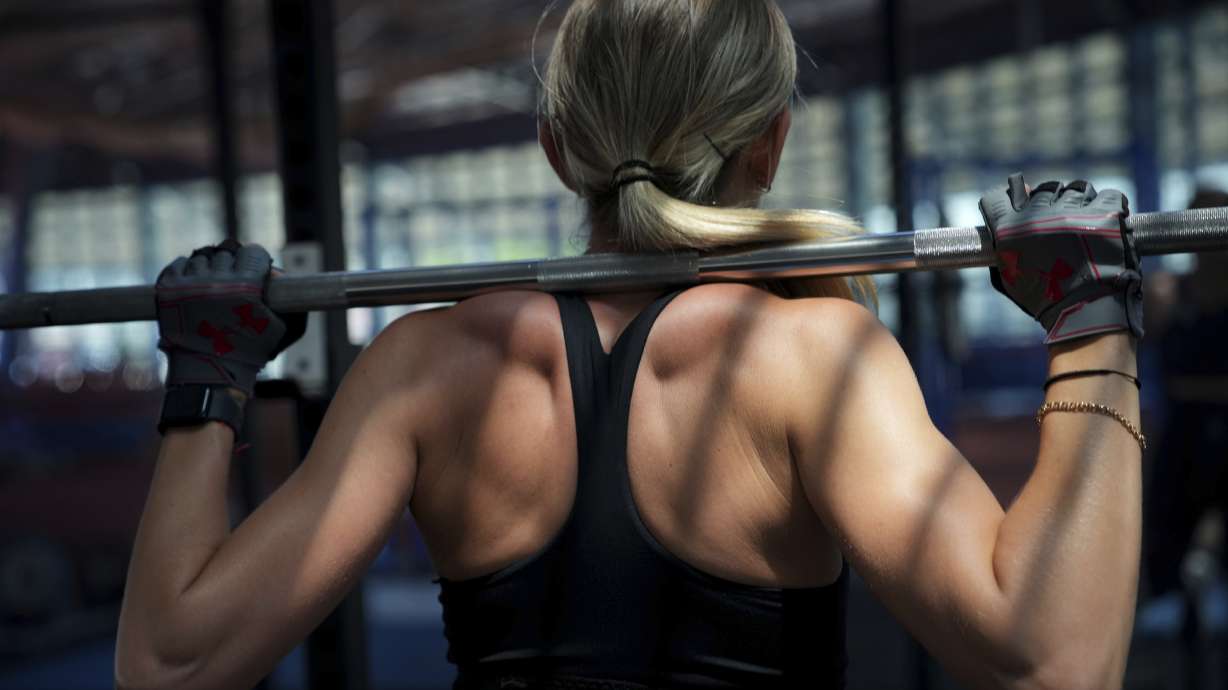 Ukrainian high jumper Kateryna Tabashnyk exercises as part of her training to qualify for the Paris Olympics, at a gym in Monte Gordo, Portugal, Wednesday, May 8, 2024. “The last two years have been like an inferno where everything is burning. And you are burning in it no matter where you are,” Tabashnyk said.