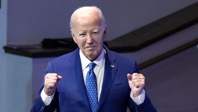 President Joe Biden attends a church service at Mt. Airy Church of God in Christ, Sunday in Philadelphia. Biden is standing firm against calls for him to drop his candidacy.