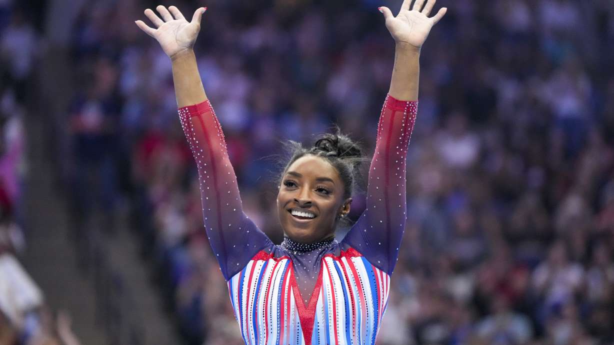 Simone Biles smiles after competing in the floor exercise at the United States Gymnastics Olympic Trials on Sunday, June 30, 2024, in Minneapolis.