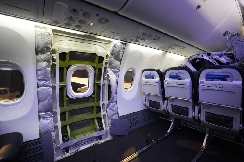 A door plug area of an Alaska Airlines Boeing 737 Max 9 aircraft awaiting inspection is pictured with paneling removed at the airline's facilities at Seattle-Tacoma International Airport on Jan. 10, in SeaTac, Wash.