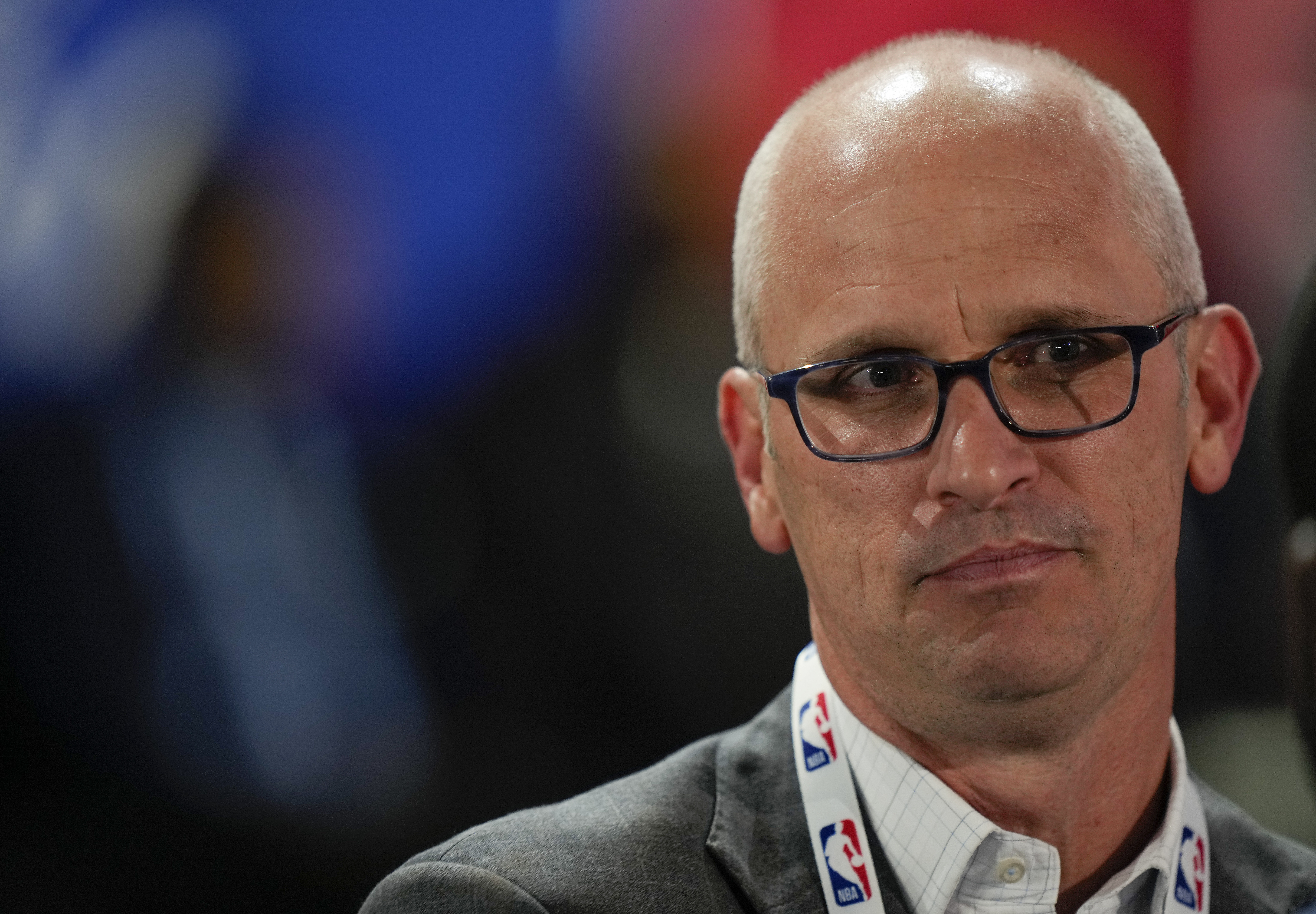 UConn men's basketball coach Dan Hurley watches the first round of the NBA basketball draft, Wednesday, June 26, 2024, in New York.