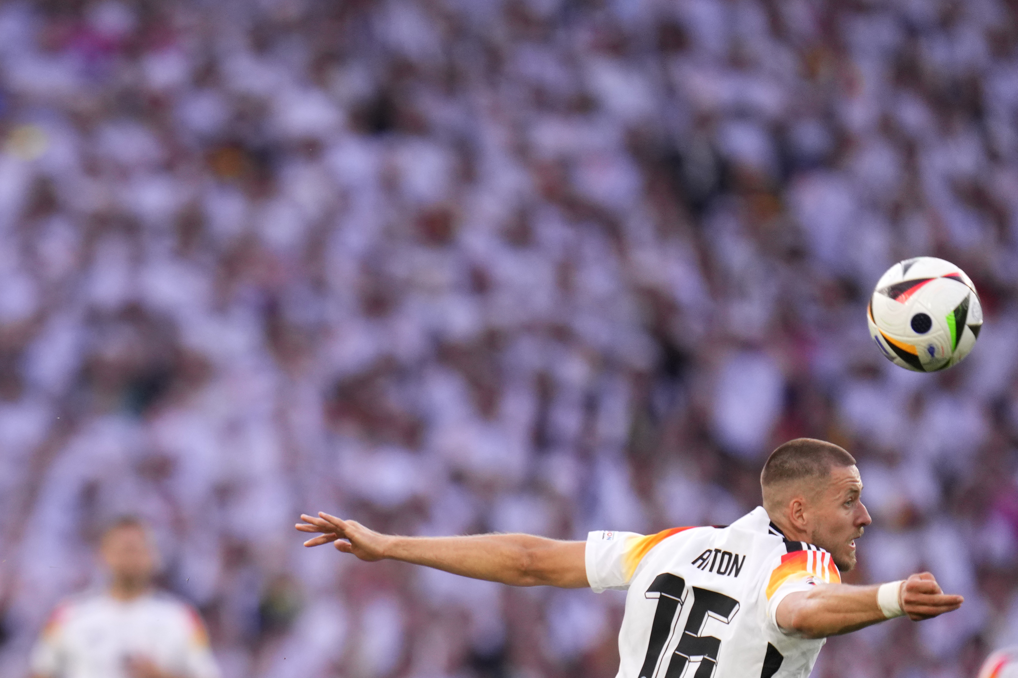 Germany's Waldemar Anton heads the ball during a quarter final match between Germany and Spain at the Euro 2024 soccer tournament in Stuttgart, Germany, Friday, July 5, 2024.