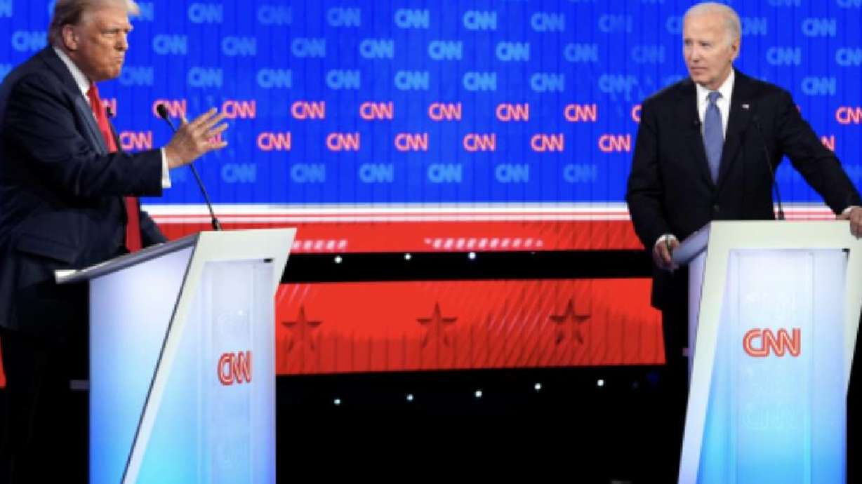 President Joe Biden, right, and Republican presidential candidate former President Donald Trump, left, participate in a presidential debate hosted by CNN, June 27, in Atlanta.