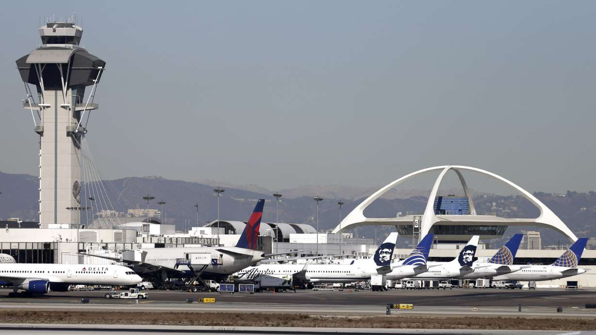 A United Airlines jet that lost a main landing gear wheel while taking off from Los Angeles later landed safely in Denver, the airline said Monday.