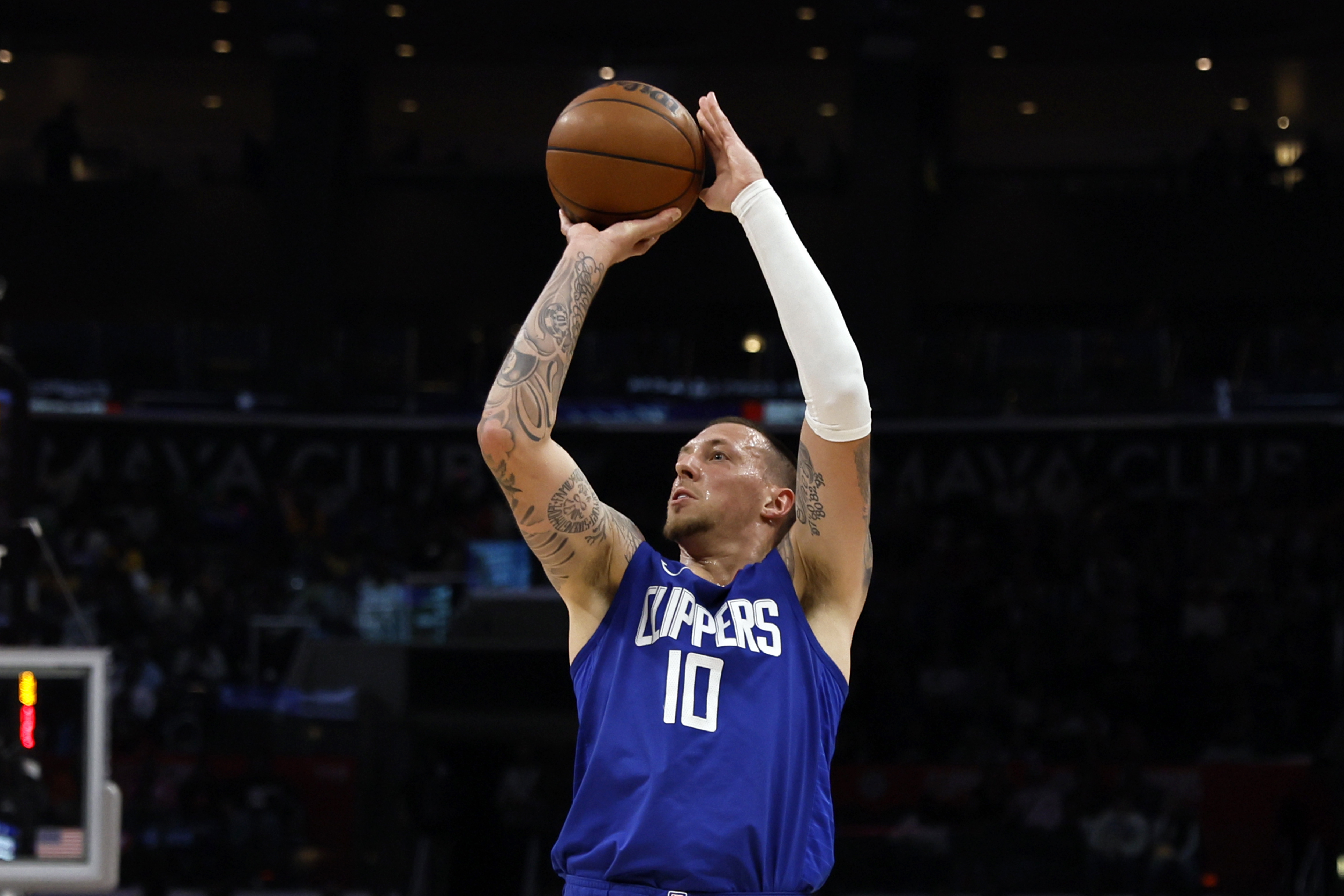 FILE - Los Angeles Clippers' Daniel Theis looks to shoot a 3-point basket during the first half of an NBA basketball game against the Utah Jazz, April 5, 2024, in Los Angeles. The New Orleans Pelicans and veteran NBA center Theis have agreed to terms on a one-year contract, a person familiar with the agreement said. The person spoke to The Associated Press on condition of anonymity Monday, July 8, 2024, because the agreement has not been announced.