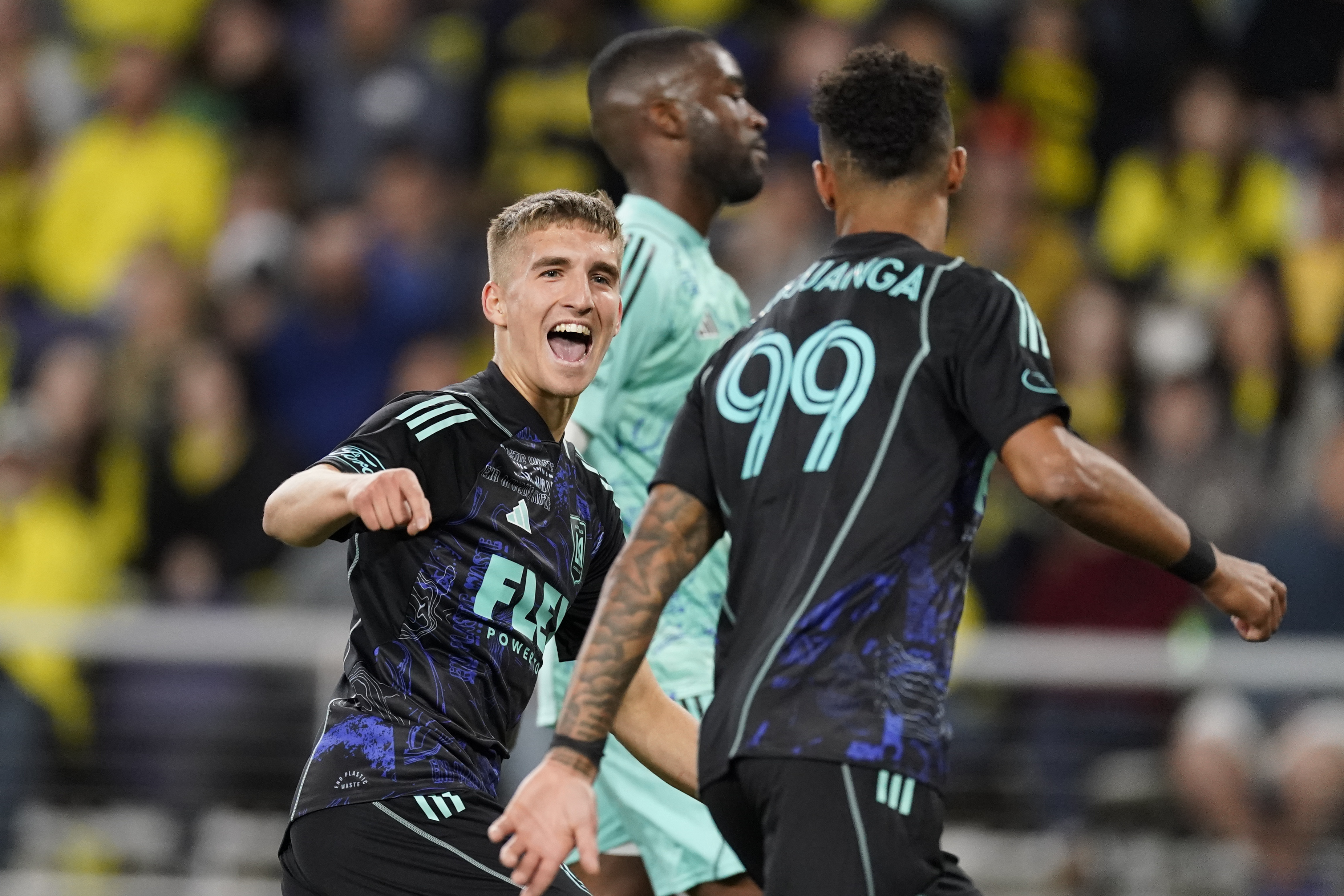 FILE - Los Angeles FC forward Stipe Biuk, centre, congratulates forward Denis Bouanga right, after his goal against the Nashville SC during the second half of an MLS soccer match Saturday, April 22, 2023 in Nashville, Tenn. Croatian forward Stipe Biuk has completed a transfer from Los Angeles Football Club in Major League Soccer to Spanish side Real Valladolid. 
