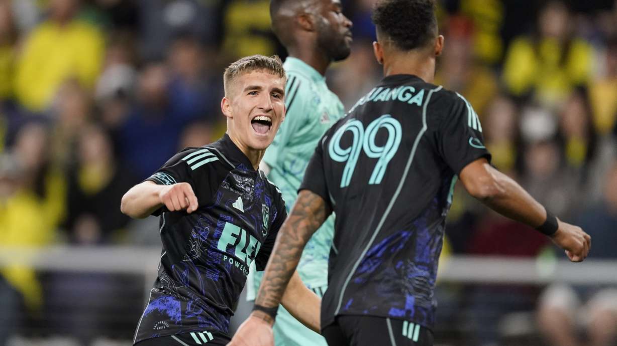 FILE - Los Angeles FC forward Stipe Biuk, centre, congratulates forward Denis Bouanga right, after his goal against the Nashville SC during the second half of an MLS soccer match Saturday, April 22, 2023 in Nashville, Tenn. Croatian forward Stipe Biuk has completed a transfer from Los Angeles Football Club in Major League Soccer to Spanish side Real Valladolid.