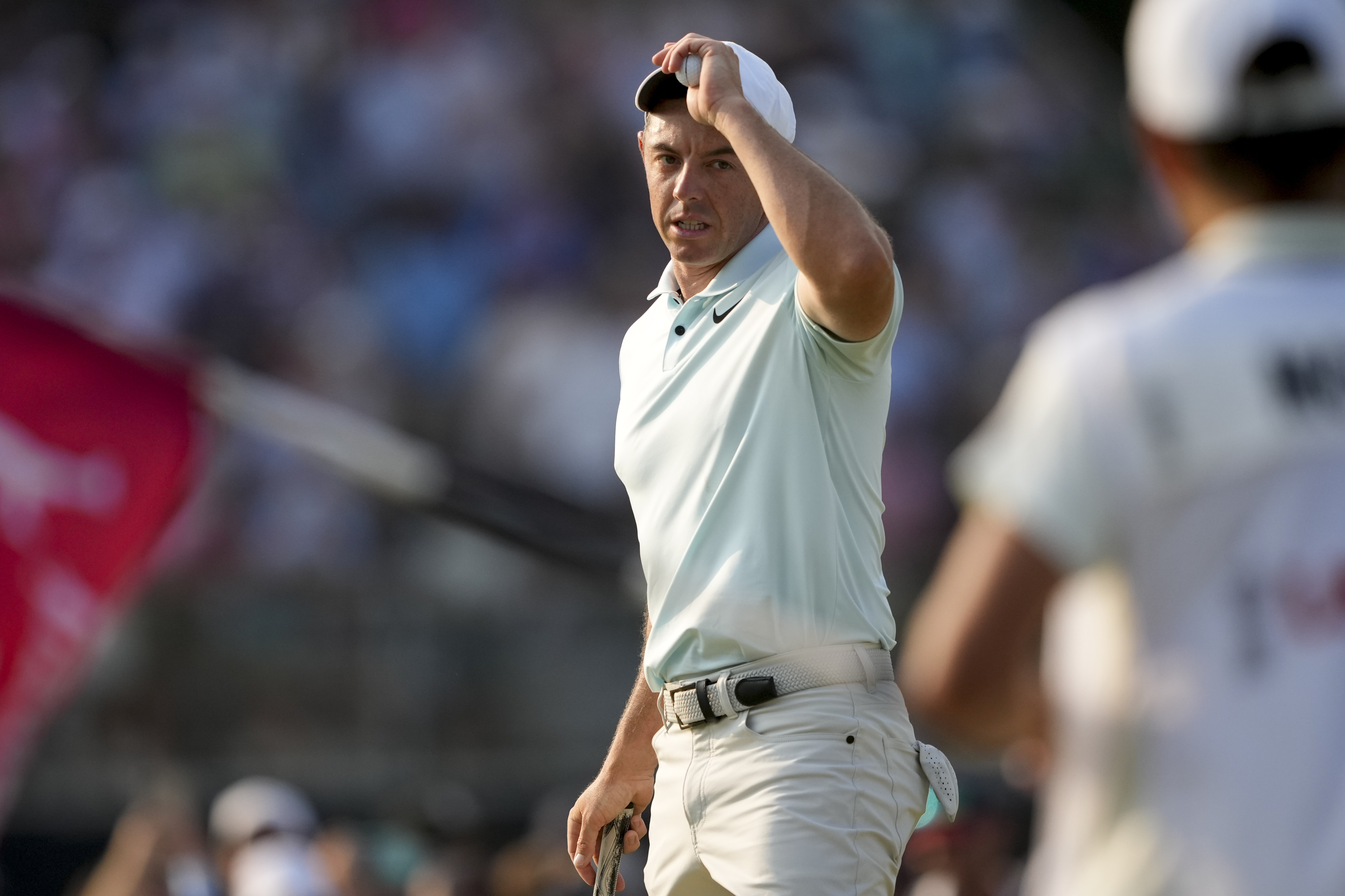 Rory McIlroy, of Northern Ireland, reacts after missing a putt on the 18th hole during the final round of the U.S. Open golf tournament Sunday, June 16, 2024, in Pinehurst, N.C. 