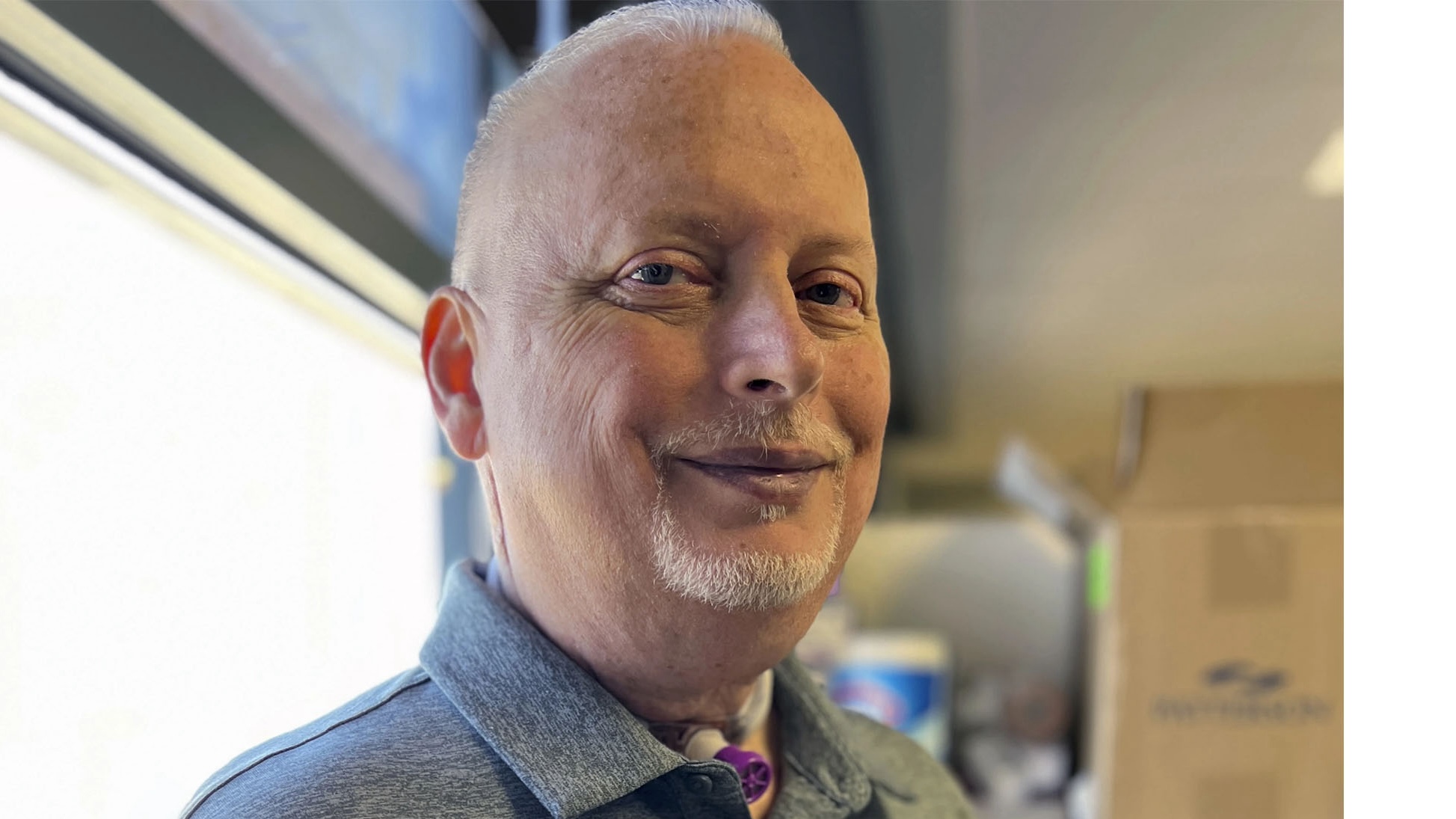 Marty Kedian poses for a photo in Mayo Clinic’s Head and Neck Regenerative Medicine Laboratory in Scottsdale, Ariz., on June 12. Kedian regained his voice after surgeons replaced his cancerous larynx with a donated one.
