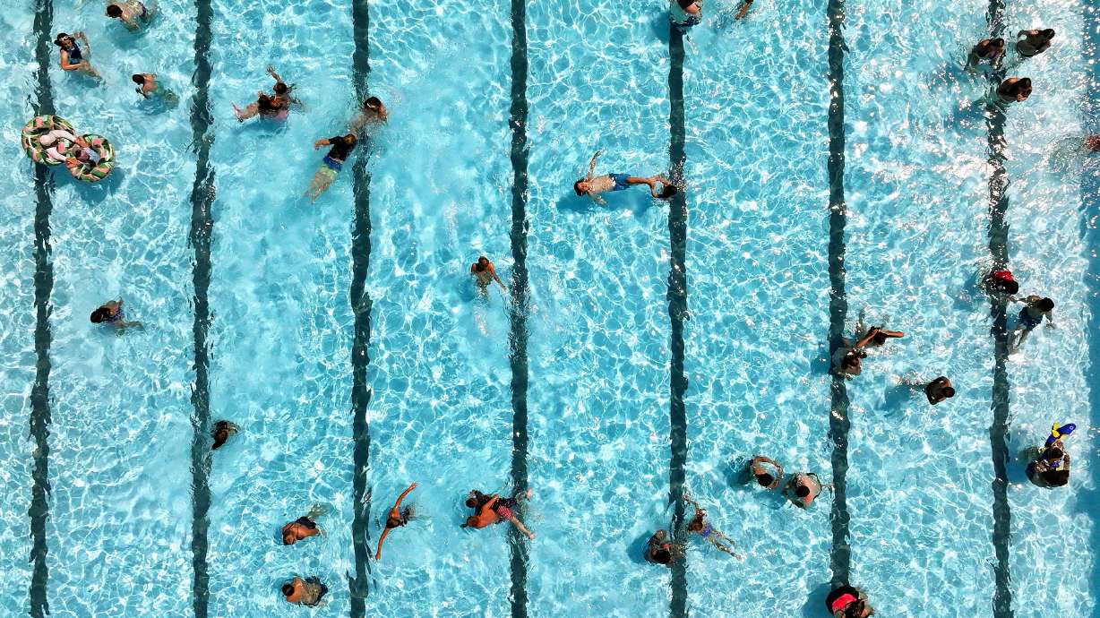 Swimmers cool off in the pool at the Cottonwood Heights Recreation Center in Cottonwood Heights on July 5, 2024. Utah could be in for another scorching summer, but long-range outlooks offer hope for a productive monsoon season.