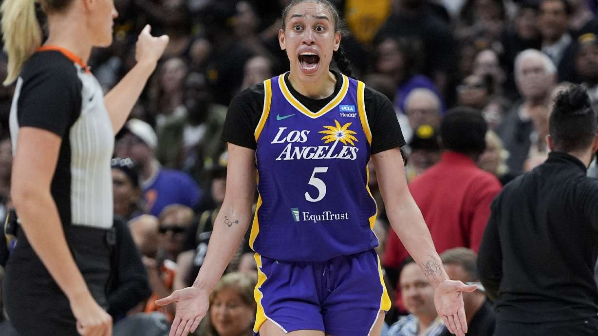 Los Angeles Sparks forward Dearica Hamby reacts during the second half of a WNBA basketball game against the Las Vegas Aces, Friday, July 5, 2024, in Los Angeles.