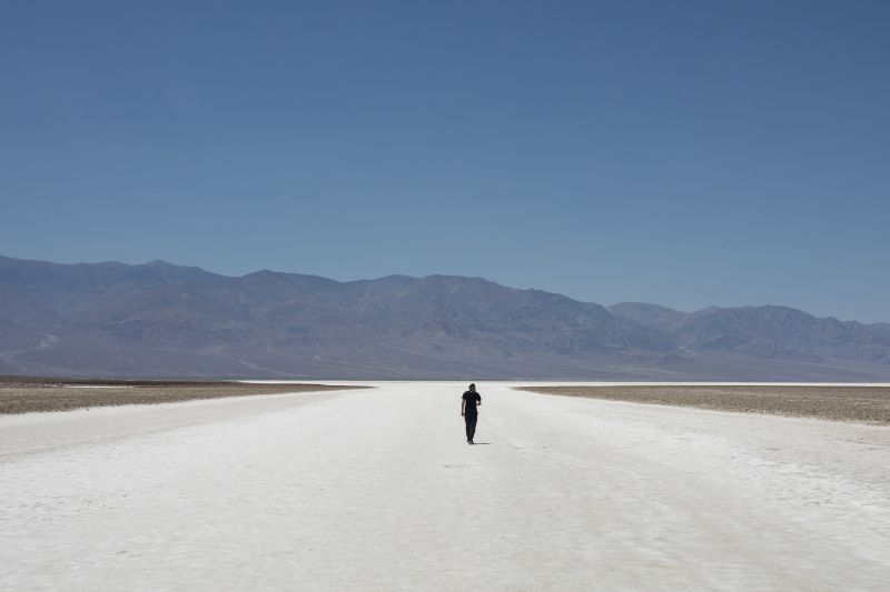 Sheik Mabrouki, of Algeria, walks through Badwater Basin, Monday in Death Valley National Park, Calif.