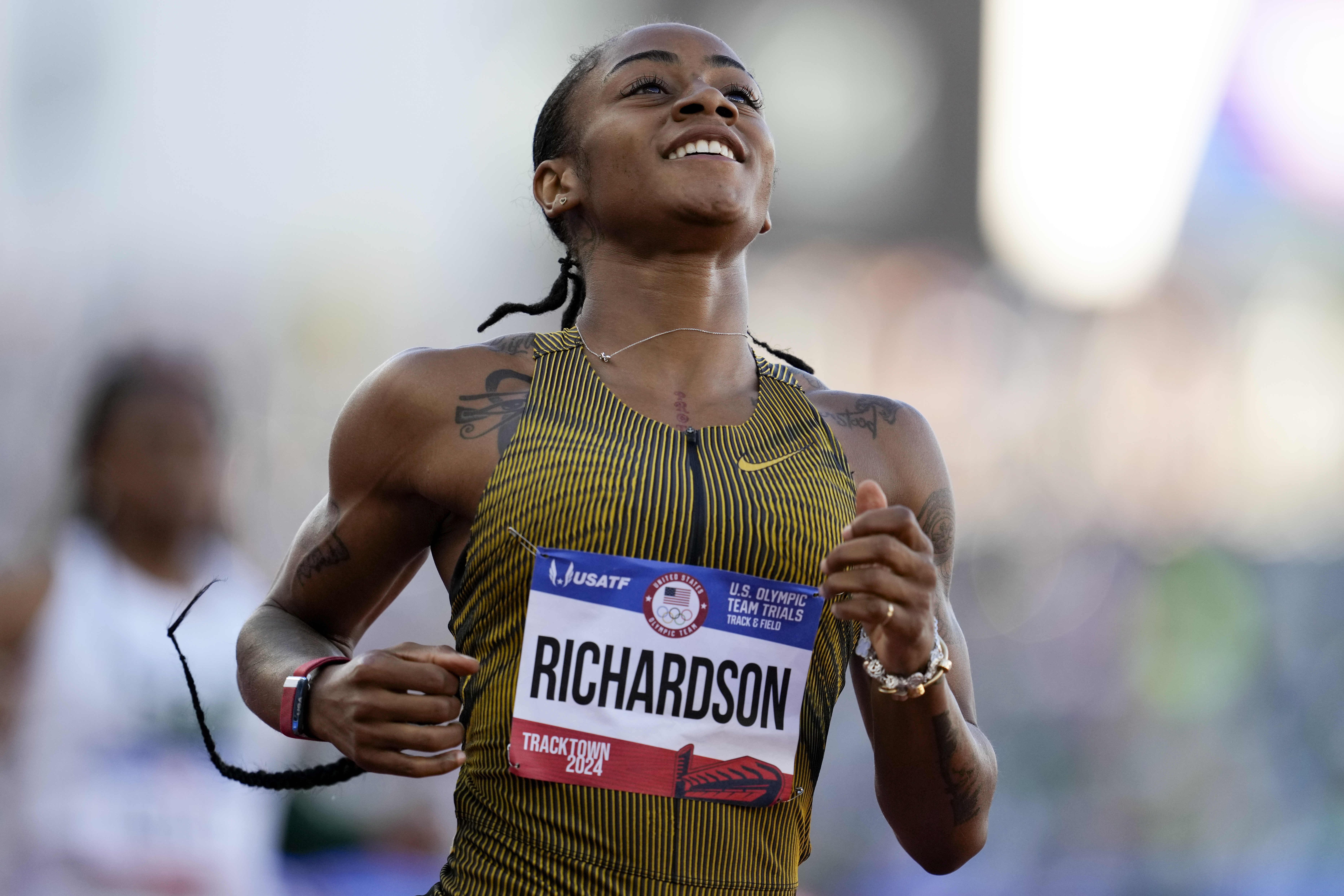 Sha'Carri Richardson wins a heat women's 200-meter semi-finals during the U.S. Track and Field Olympic Team Trials Friday, June 28, 2024, in Eugene, Ore. 