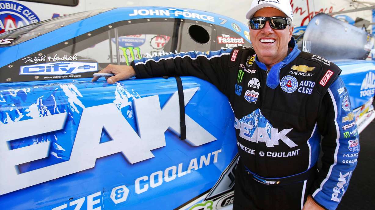 FILE - Funny Car driver John Force looks to get back on track for the last day of qualifying at the NHRA Kansas Nationals at Heartland Park, May 21, 2016, in Topeka Kansas.