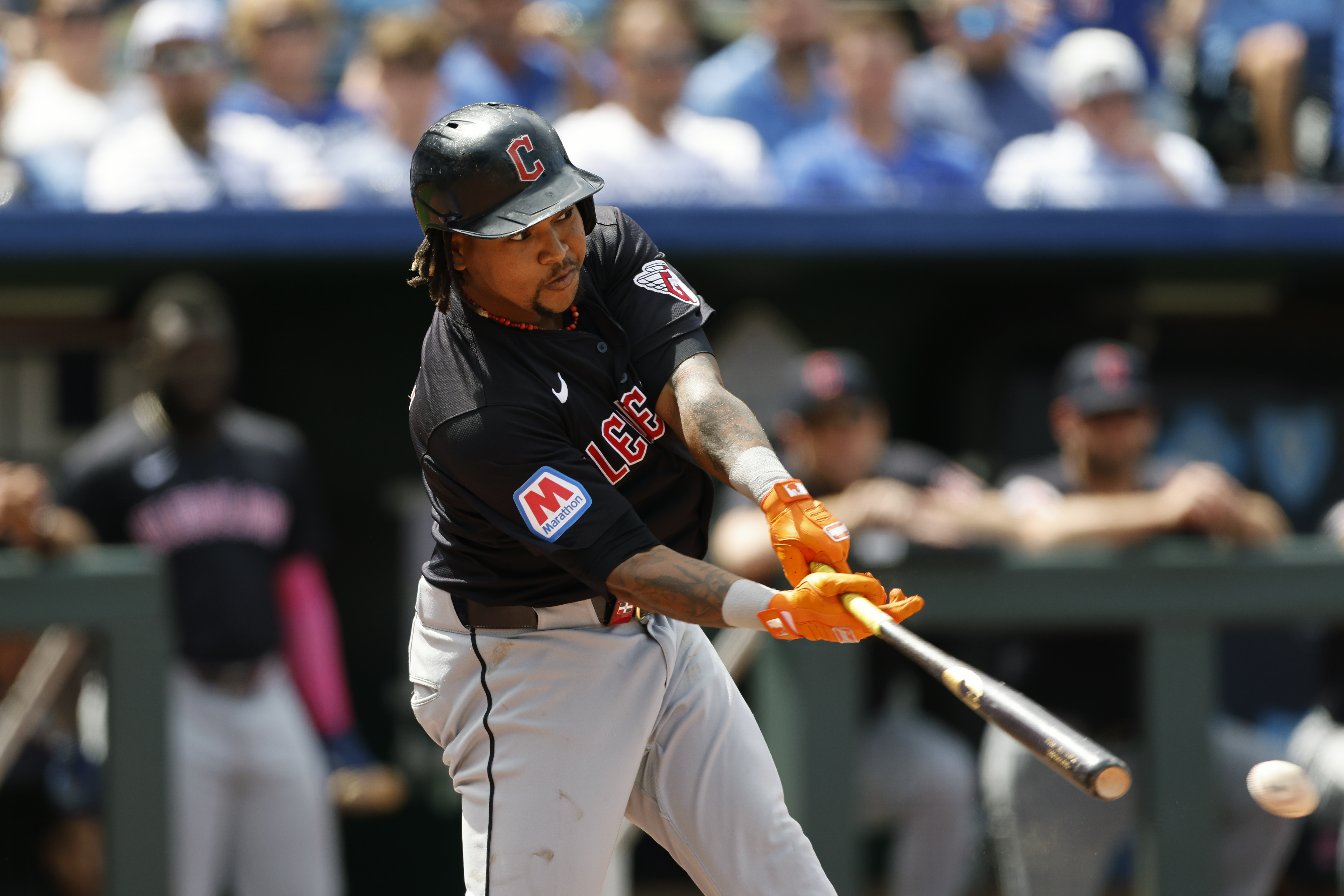 Cleveland Guardians' Jose Ramirez hits an RBI double during the eighth inning of a baseball game against the Kansas City Royals in Kansas City, Mo., Sunday, June 30, 2024. 