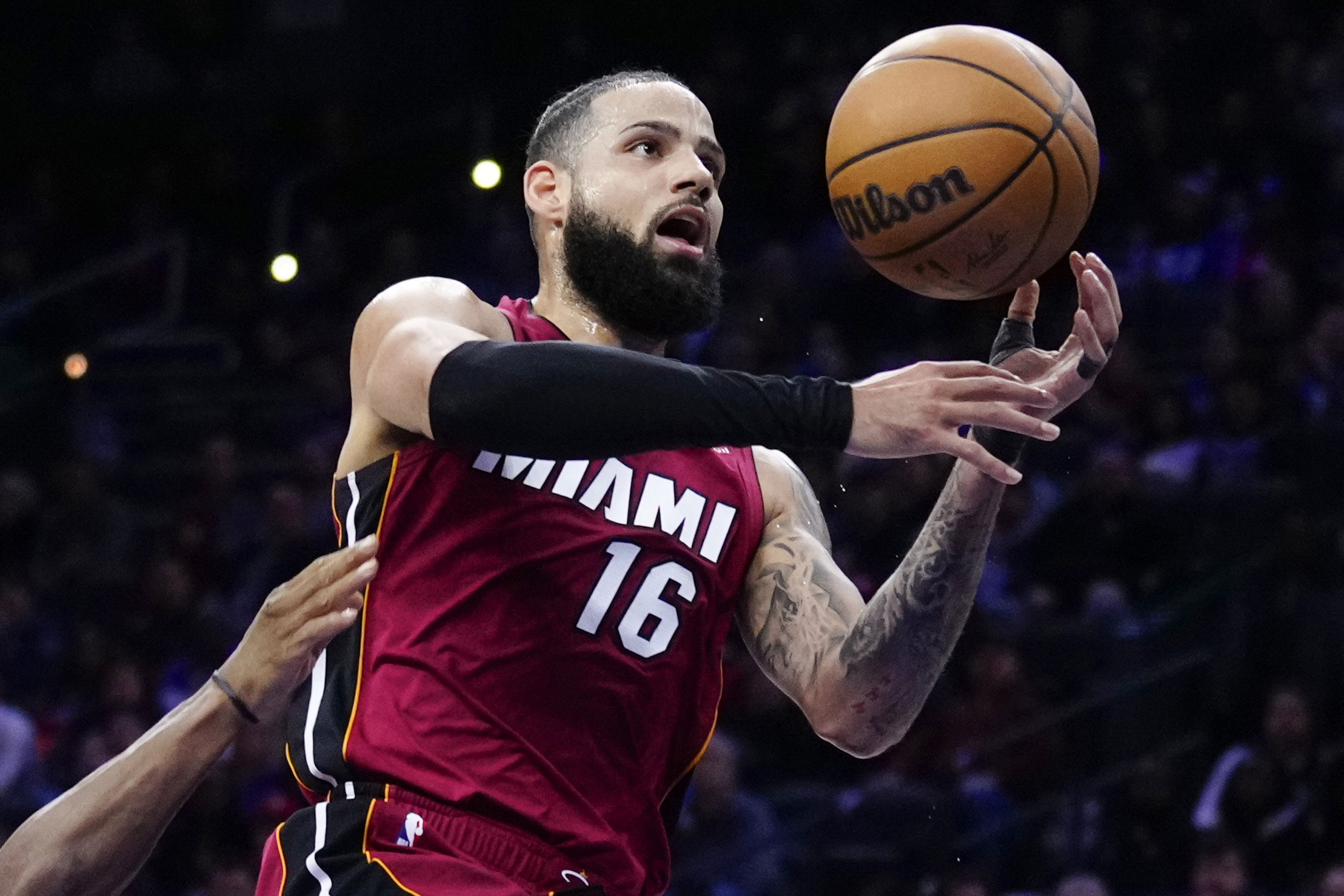 FILE - Miami Heat's Caleb Martin (16) goes up for a shot during the first half of an NBA basketball game, Monday, March 18, 2024, in Philadelphia. 