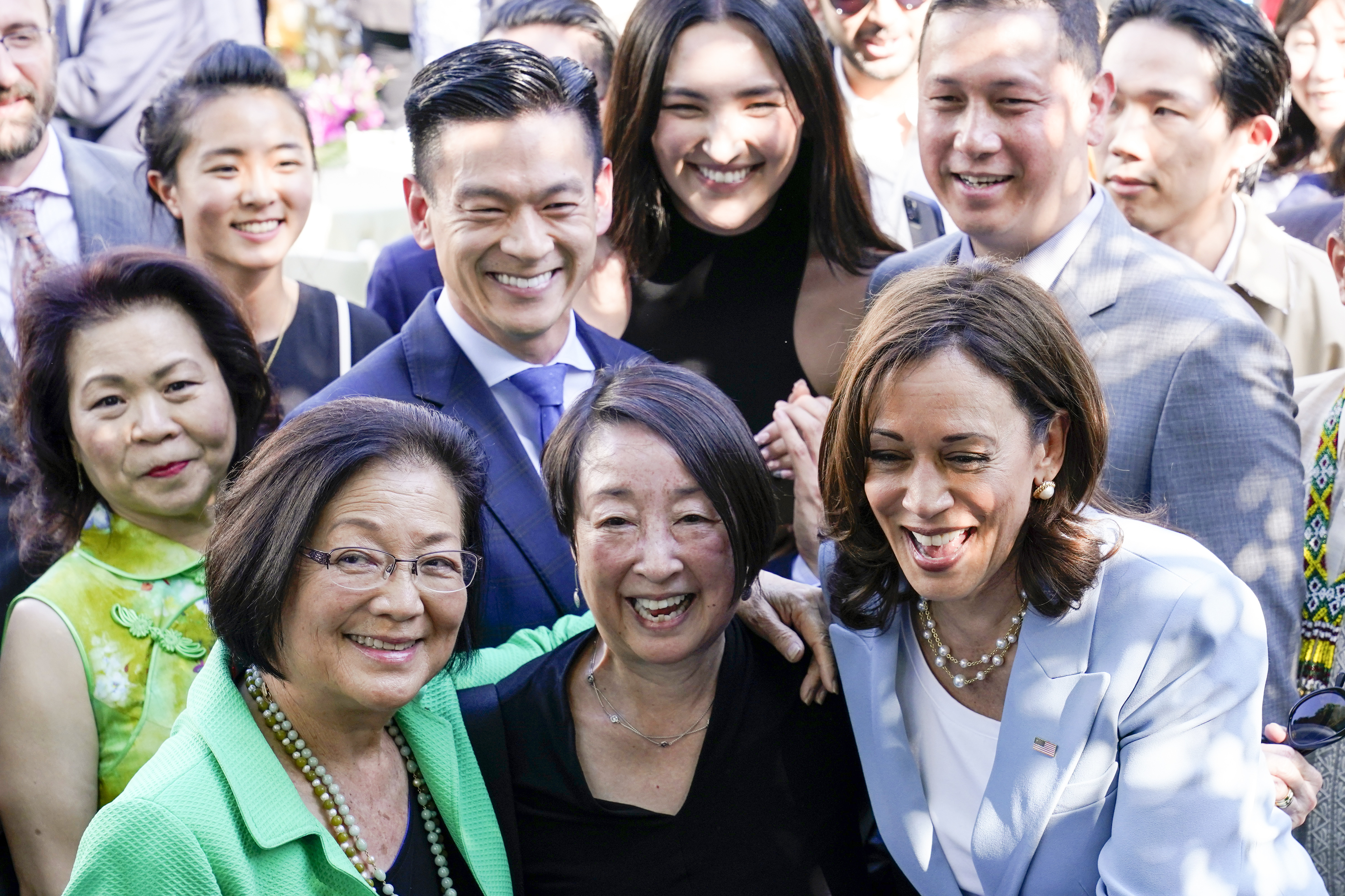 FILE - Vice President Kamala Harris takes a photo with Sen. Mazie Hirono, D-Hawaii, left, and others, in the Rose Garden of the White House in Washington, May 17, 2022, during a reception to celebrate Asian American, Native Hawaiian, and Pacific Islander Heritage Month. President Joe Biden’s reelection campaign is launching its formal outreach campaign to Asian-American voters, putting Vice President Kamala Harris at the forefront of the effort with events in Nevada and Pennsylvania this week. 