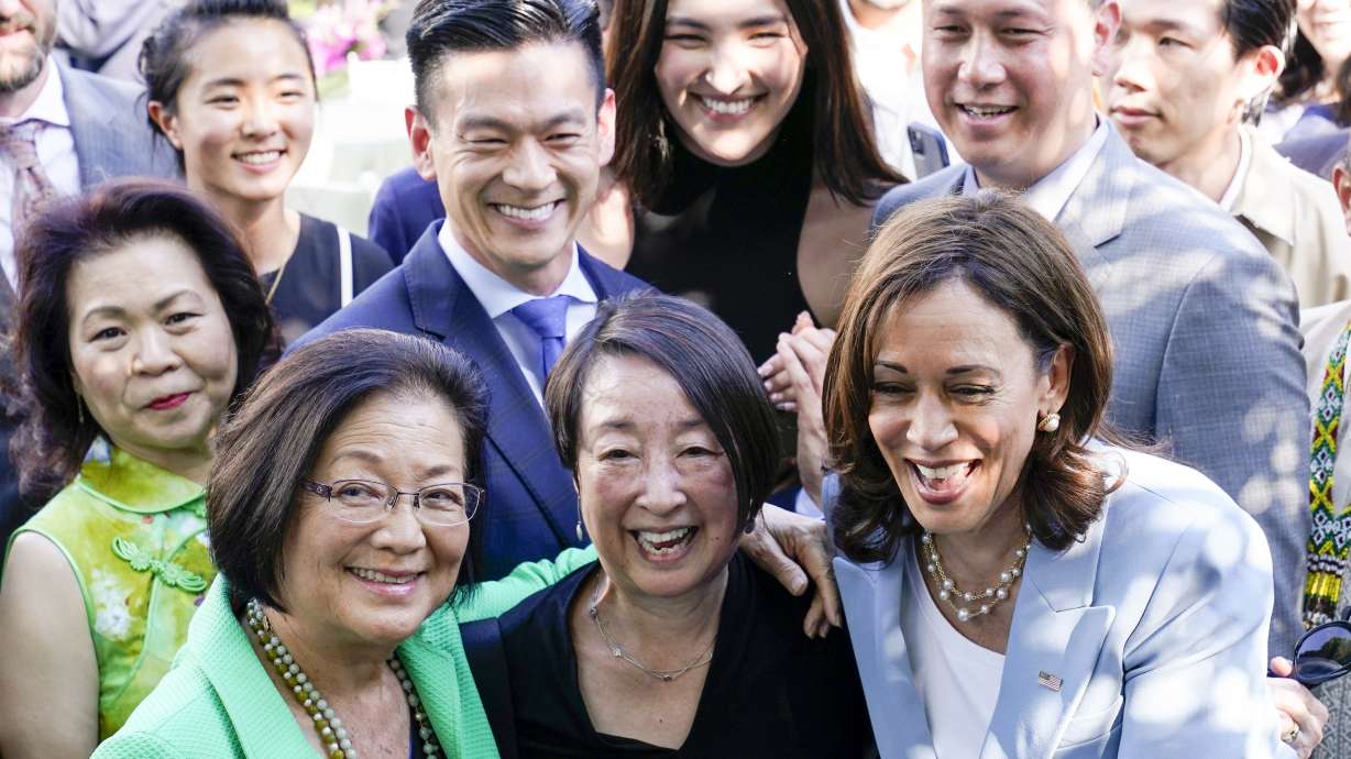 FILE - Vice President Kamala Harris takes a photo with Sen. Mazie Hirono, D-Hawaii, left, and others, in the Rose Garden of the White House in Washington, May 17, 2022, during a reception to celebrate Asian American, Native Hawaiian, and Pacific Islander Heritage Month. President Joe Biden’s reelection campaign is launching its formal outreach campaign to Asian-American voters, putting Vice President Kamala Harris at the forefront of the effort with events in Nevada and Pennsylvania this week.