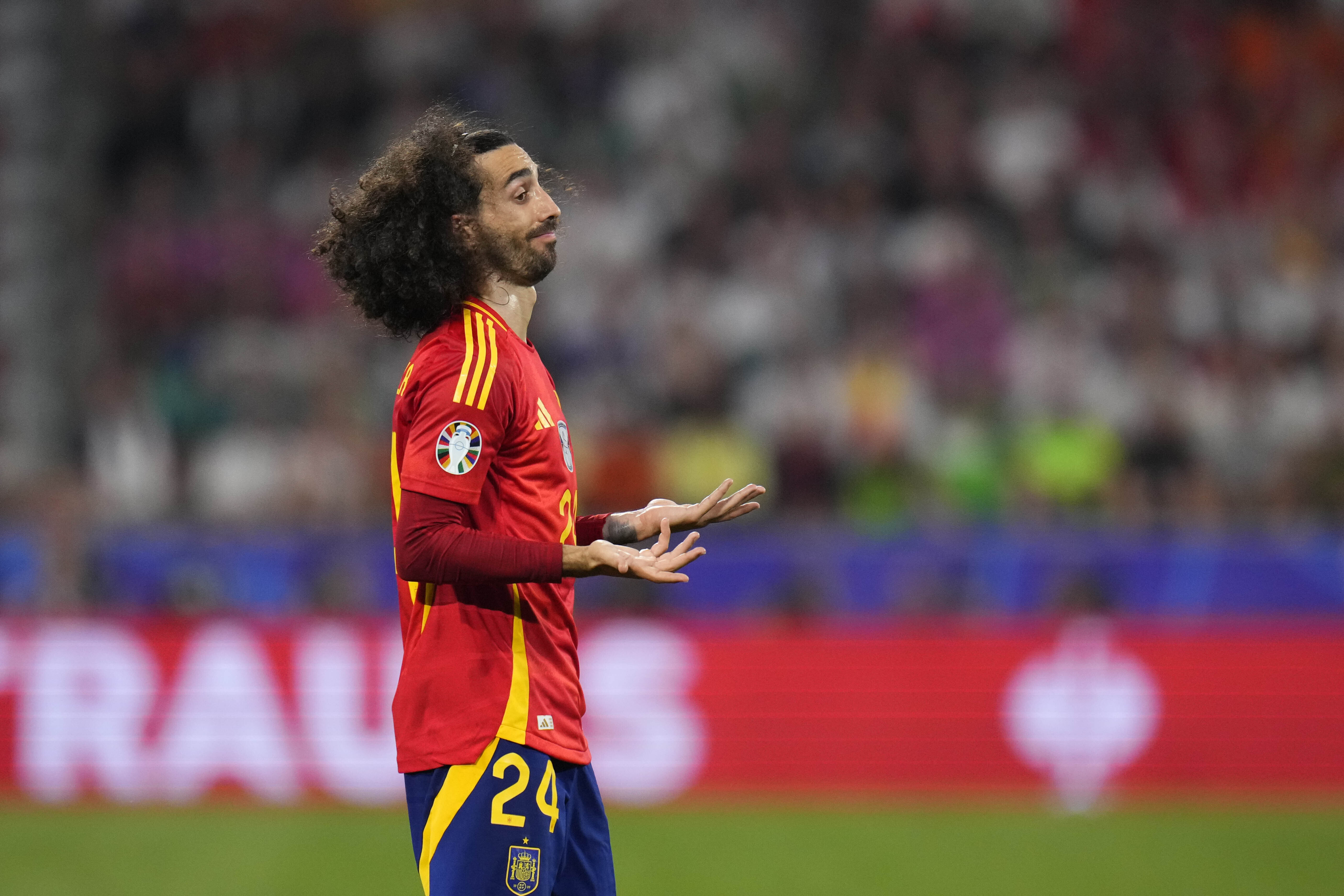 Spain's Marc Cucurella gestures during a semifinal match between Spain and France at the Euro 2024 soccer tournament in Munich, Germany, Tuesday, July 9, 2024. 