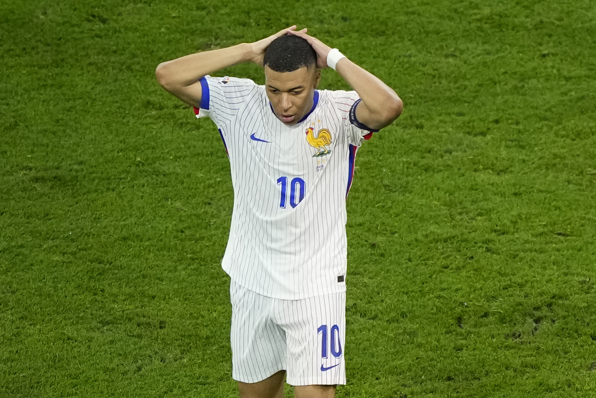 Kylian Mbappe of France reacts after missing a chance to score during a semifinal match between Spain and France at the Euro 2024 soccer tournament in Munich, Germany, Tuesday, July 9, 2024.