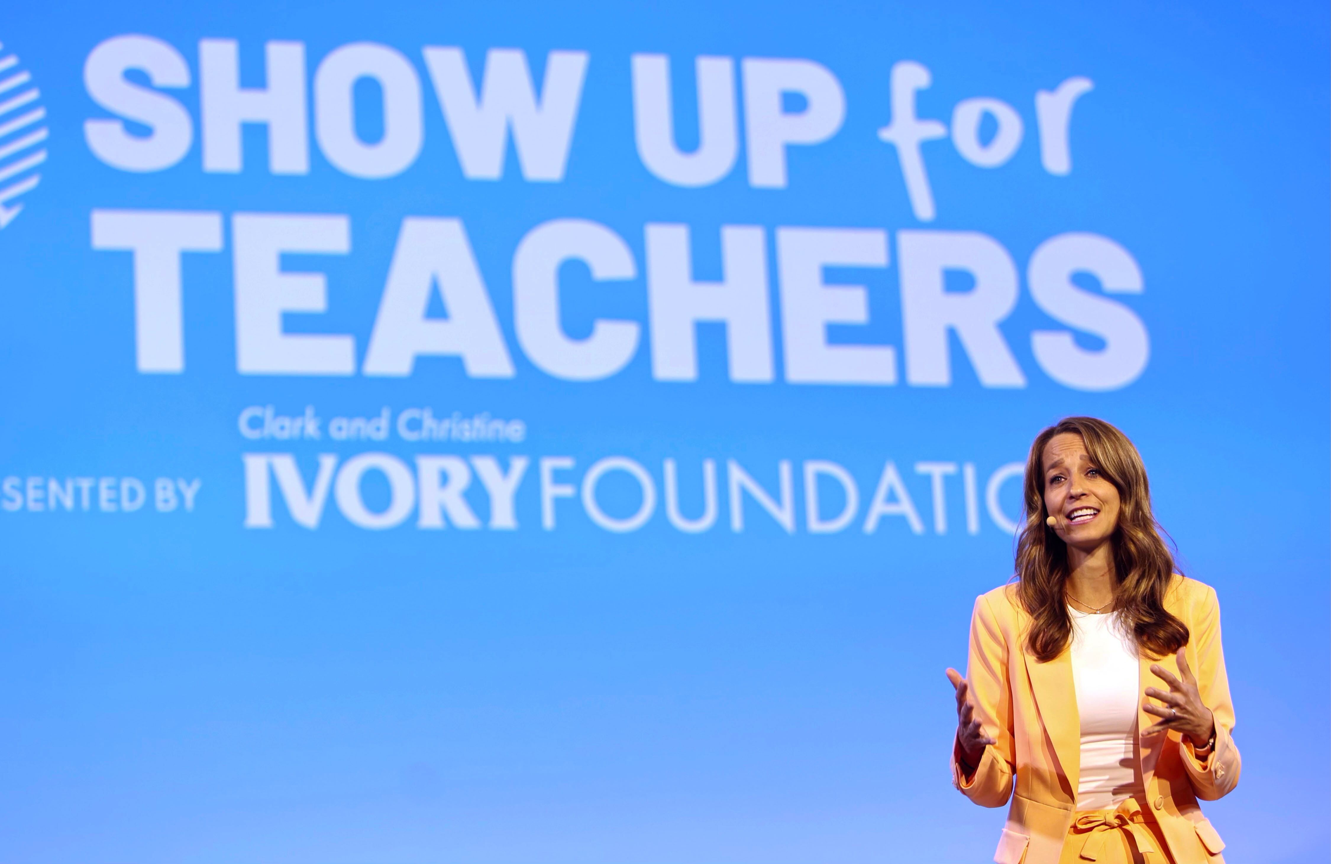 First lady Abby Cox speaks at the Show Up For Teachers conference in Sandy, Tuesday. Human connection expert Marisa G. Franco told attendees that new teachers paired with more experienced educator mentors are more likely to remain in teaching.