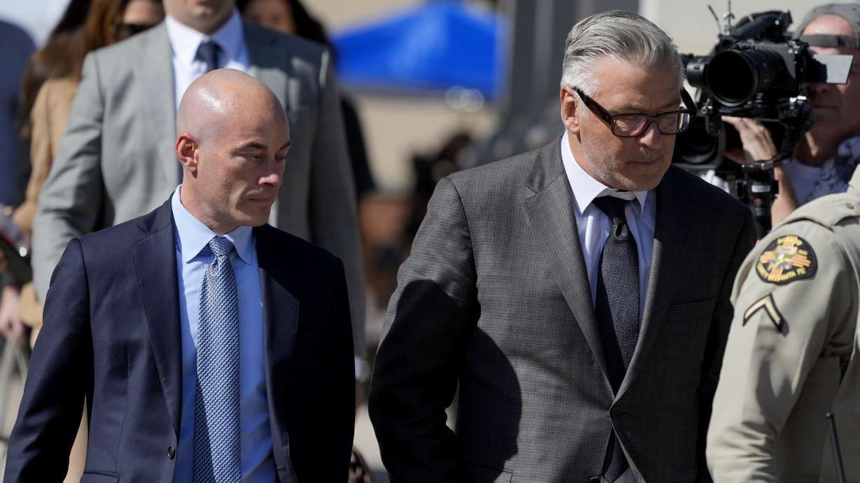 Actor Alec Baldwin, right, and attorney Luke Nikas, leave court after jury selection in Baldwin's involuntary manslaughter trial, Tuesday, in Santa Fe, N.M. A jury is set to hear opening statements Wednesday.