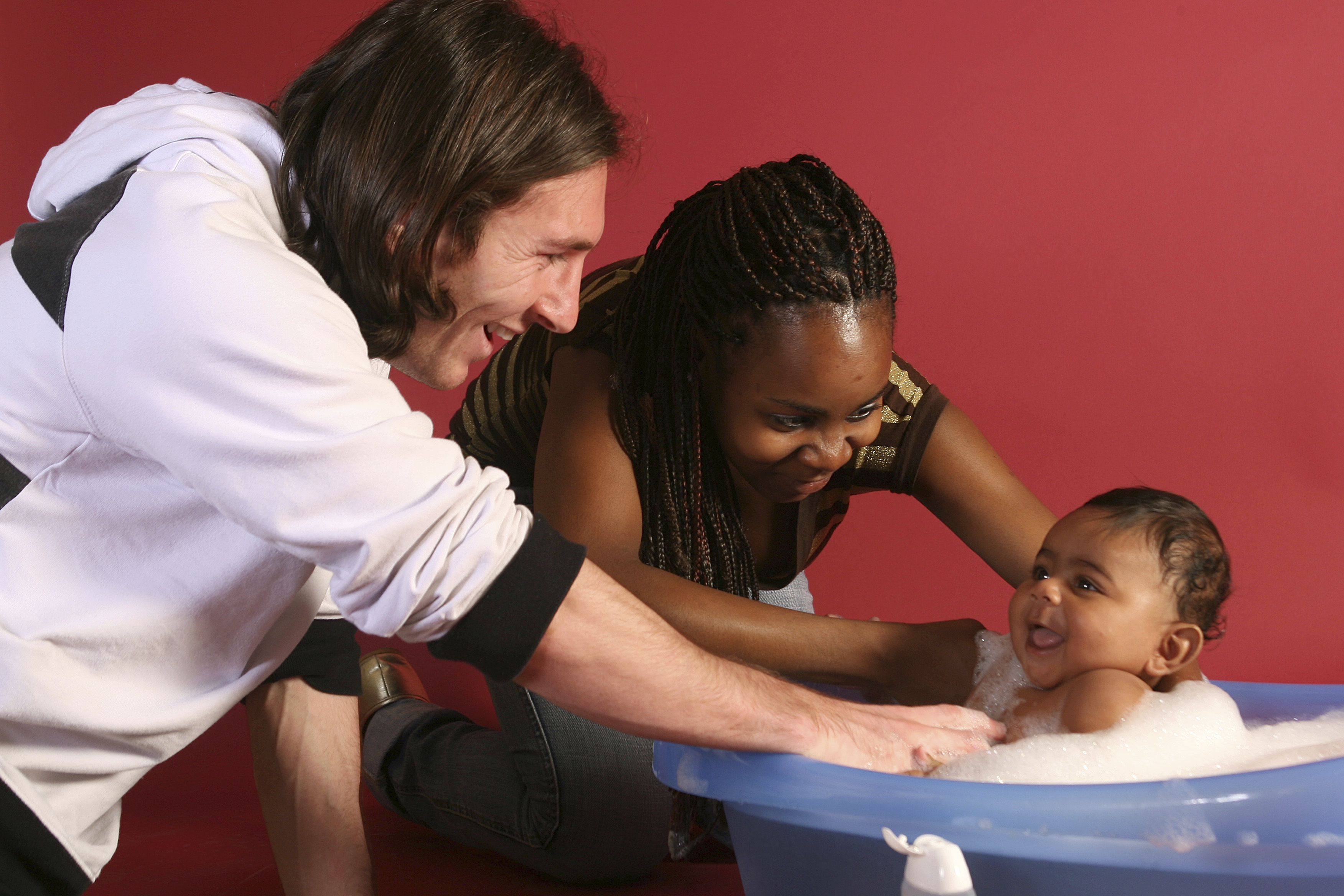 This photo taken in Sept. 2007 shows a 20-year-old Lionel Messi, who had embarked on his legendary Barcelona career just over four years prior, helping to bathe Lamine Yamal, who was merely six months old at the time with Yamal's mother Sheila Ebana, during a photo session in the dressing room of the Camp Nou stadium in Barcelona, Spain. Lamine Yamal is now a soccer sensation for both Spain and Barcelona and he is still only 16-years-old. 