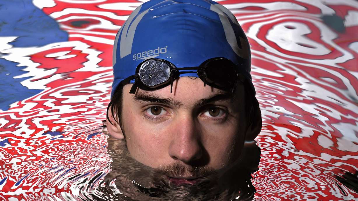 FILE - Olympic gold medalist Michael Phelps poses in the Belmont Plaza Olympic Pool in Long Beach, Calif., Jan. 18, 2008. Almost any Olympic athlete can tell you where the spark was lit to push them into sports. For many, it was in front of a TV set as a kid, watching the Summer Games play out in some faraway place — and often, Michael Phelps was the athlete that drew their interest.