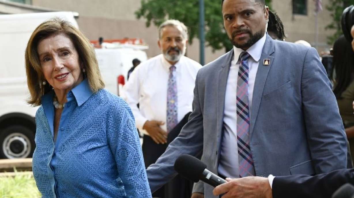 Rep. Nancy Pelosi, D-Calif., the speaker emerita, left, arrives at the Democratic National Headquarters with other Democratic lawmakers to discuss the future of President Biden running for the presidency, Tuesday in Washington.