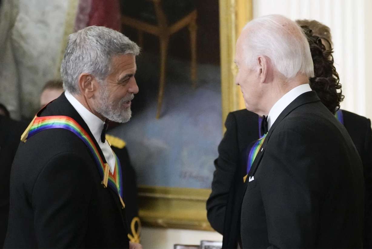 Actor George Clooney, left, meets with President Joe Biden in Washington on Dec. 4, 2022.
