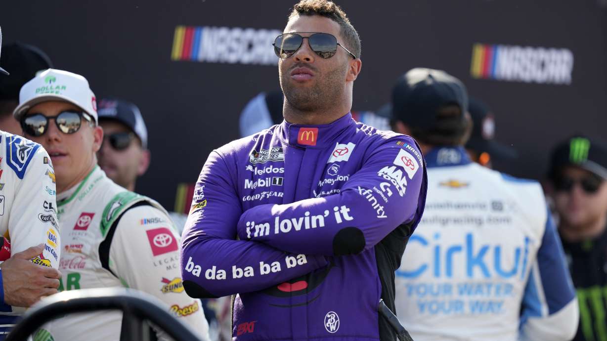 Bubba Wallace looks on before driver introductions at a NASCAR Cup Series auto race, Sunday, June 16, 2024, at Iowa Speedway in Newton, Iowa.