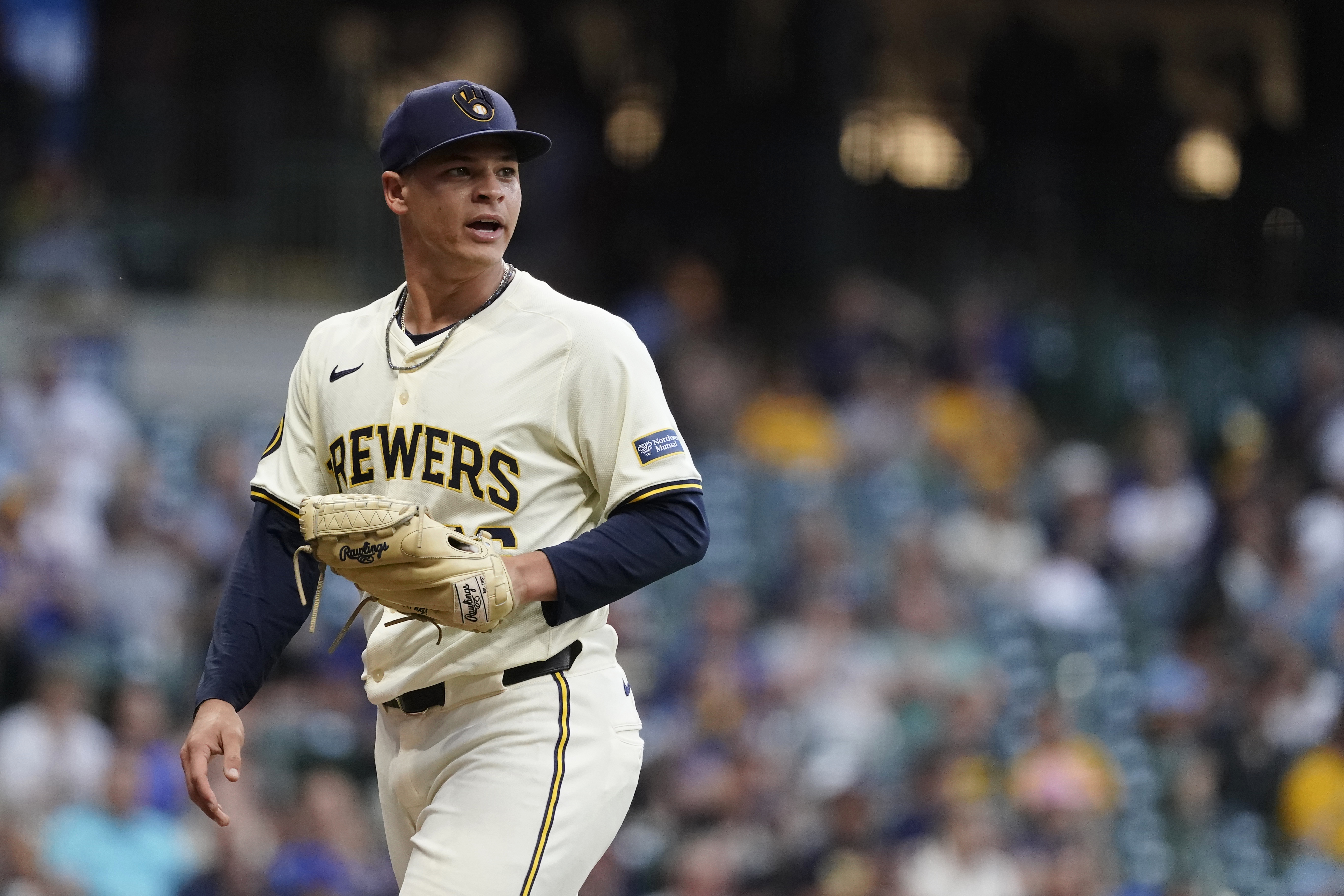Milwaukee Brewers' Tobias Myers reacts to a defensive play as he walks to the dugout in the fourth inning of a baseball game against the Pittsburgh Pirates, Wednesday, July 10, 2024, in Milwaukee. 