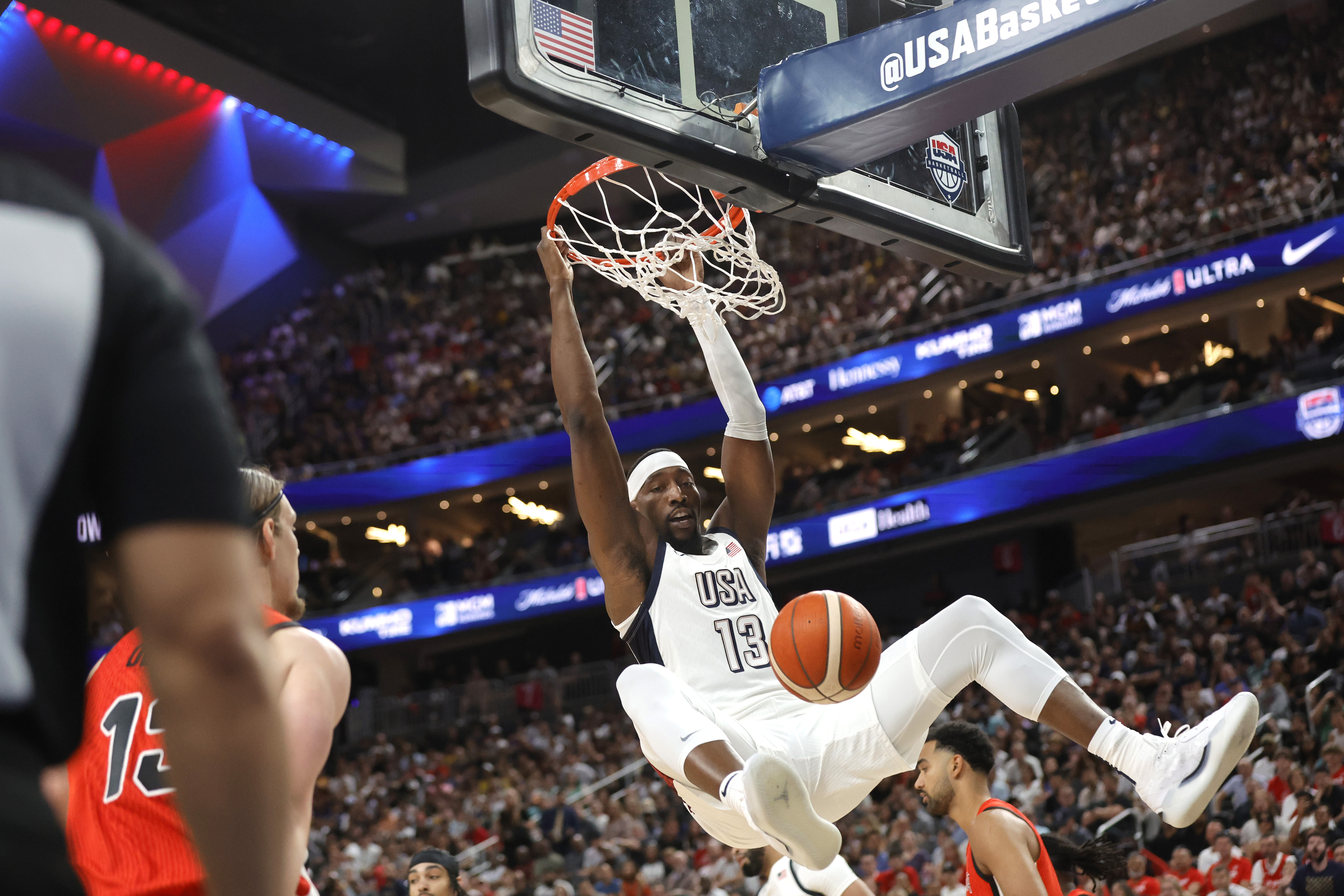 United States center Bam Adebayo (13) dunks during the first half of an exhibition basketball game against Canada, Wednesday, July 10, 2024, in Las Vegas.