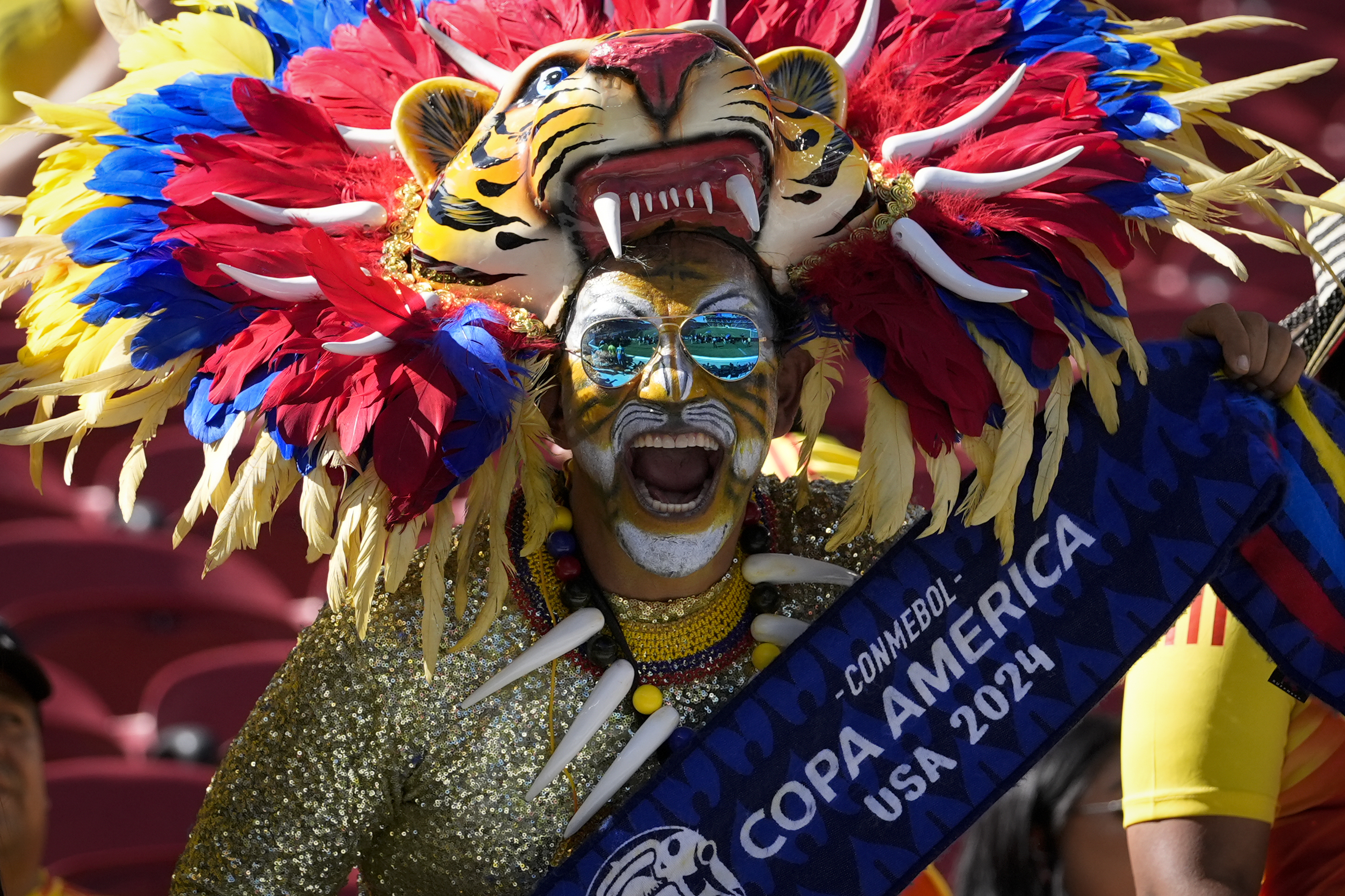 A fan for Colombia yells in the stands before a Copa America Group D soccer match against Brazil, Tuesday, July 2, 2024, in Santa Clara, Calif. 