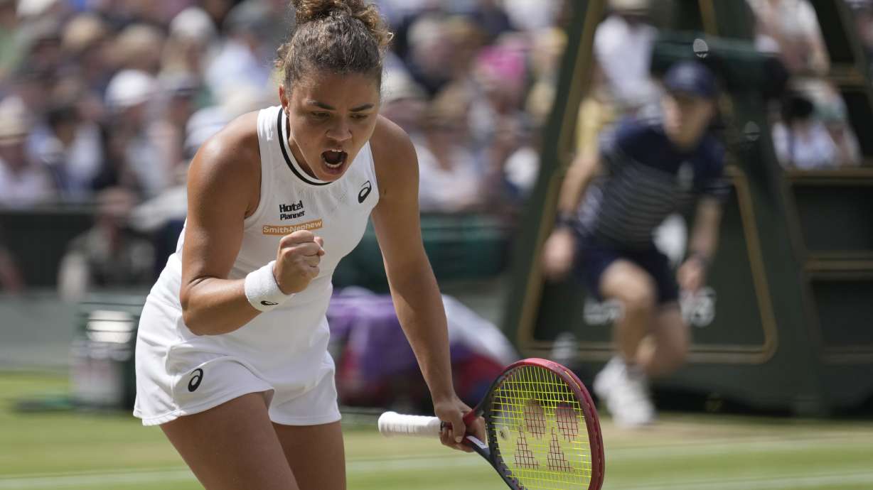 Jasmine Paolini of Italy celebrates winning a point against Donna Vekic of Croatia during their semifinal match at the Wimbledon tennis championships in London, Thursday, July 11, 2024.