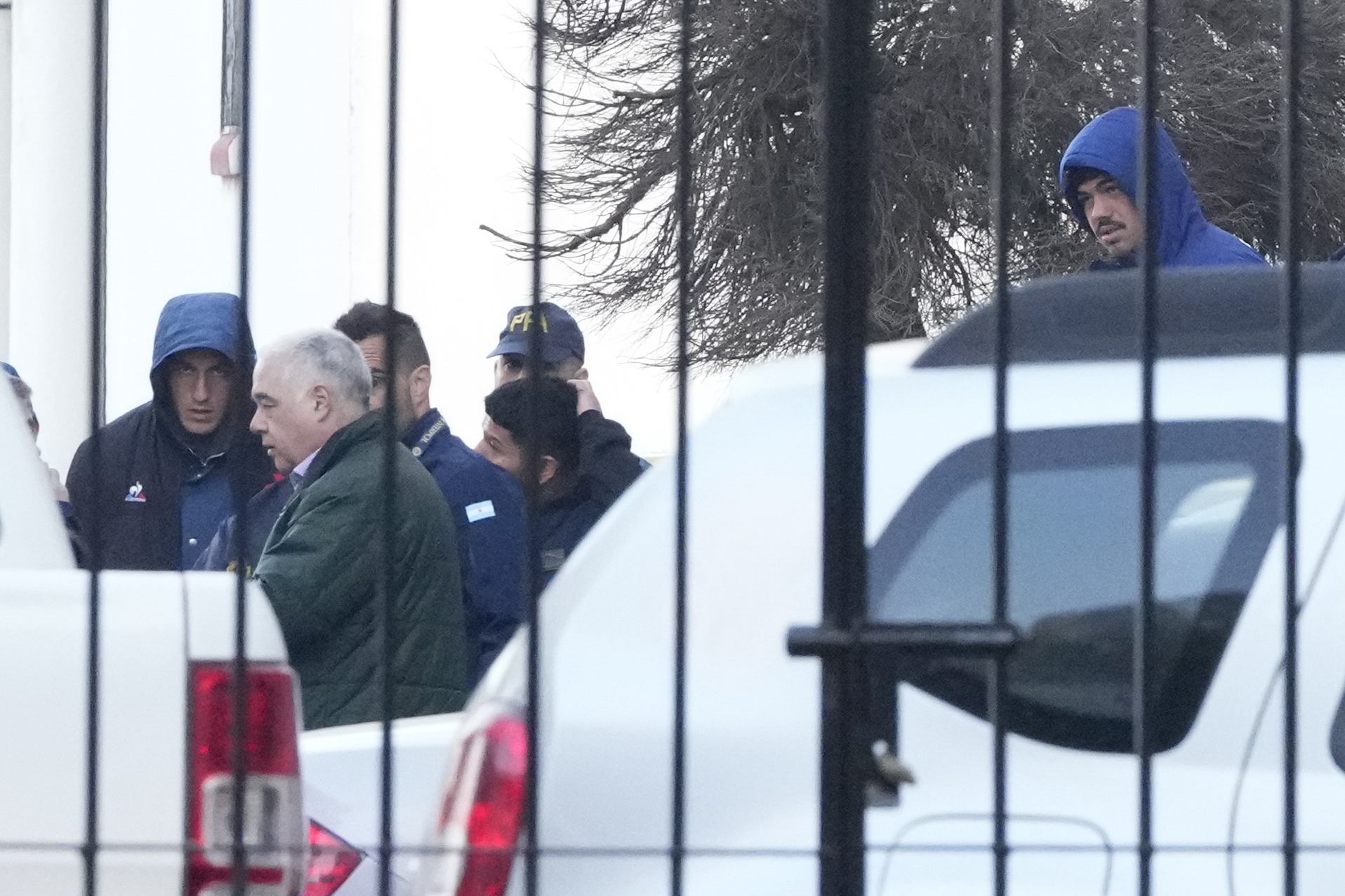 Police escort French rugby players Oscar Jegou, left, and Hugo Auradou, right, in Buenos Aires, Argentina, Thursday, July 11, 2024. The players were arrested following a formal complaint filed against them for alleged sexual assault, after France played Argentina in a test rugby match in Mendoza on July 6. 