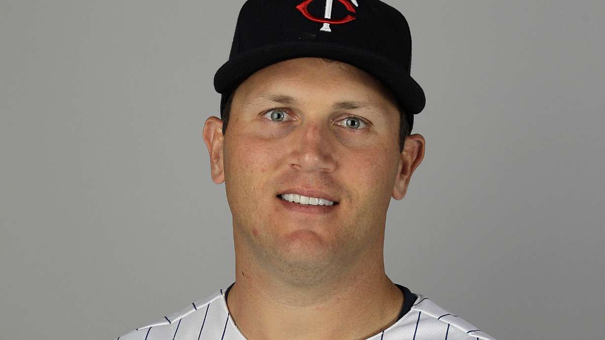 FILE - Sean Burroughs of the Minnesota Twins baseball team is shown Feb. 27, 2012, in Fort Myers, Fla. Burroughs, a two-time Little League World Series champion who won an Olympic gold medal and went on to a major league career that was interrupted by substance abuse, died of fentanyl intoxication, according to the Los Angeles County Medical Examiner’s office. His death on May 9 in Long Beach, California, was accidental, according to online records released this week. Burroughs was 43.