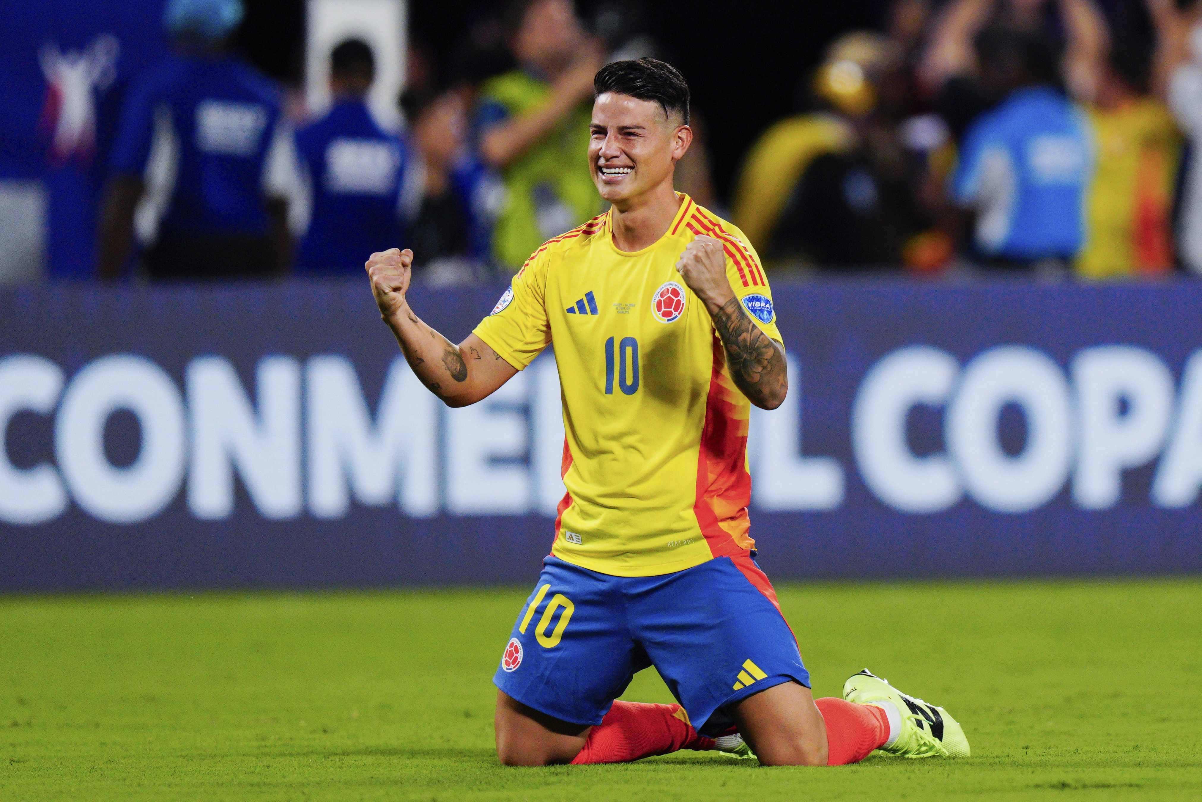 Colombia's James Rodriguez celebrates beating Uruguay 1-0 in a Copa America semifinal soccer match in Charlotte, N.C., Wednesday, July 10, 2024.
