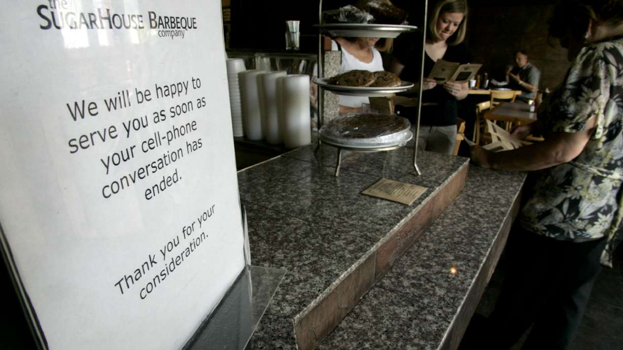 Customers decide what to order for lunch at the SugarHouse Barbeque Company on May 5, 2008. The restaurant is slated to close in mid-August after nearly three decades of operation.