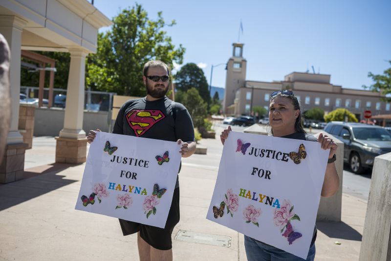 Jonathan Zwiebel, left, and his mother Janelle Rogers stand outside District Court demanding justice for cinematographer Halyna Hutchins, during the trial of actor Alec Baldwin, Wednesday, in Santa Fe, N.M.