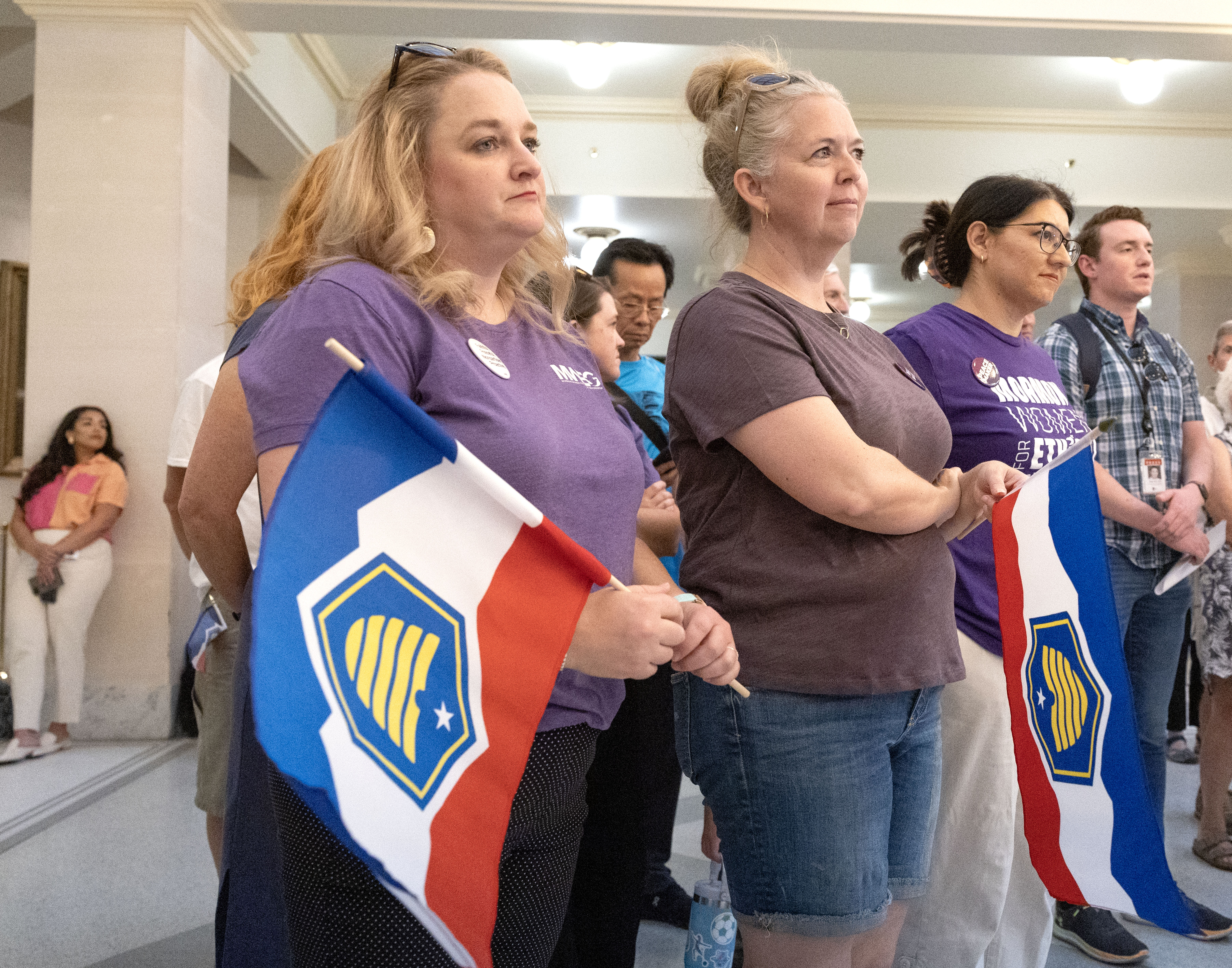 Alyssa May, on the left, and Molly Hadfield, center, from Mormon Women for Ethical Government, attend a press conference July 11. The plaintiffs who sued the Utah Legislature over its redrawing of U.S. House districts now seek new district maps in the wake of a favorable Utah Supreme Court ruling in July.